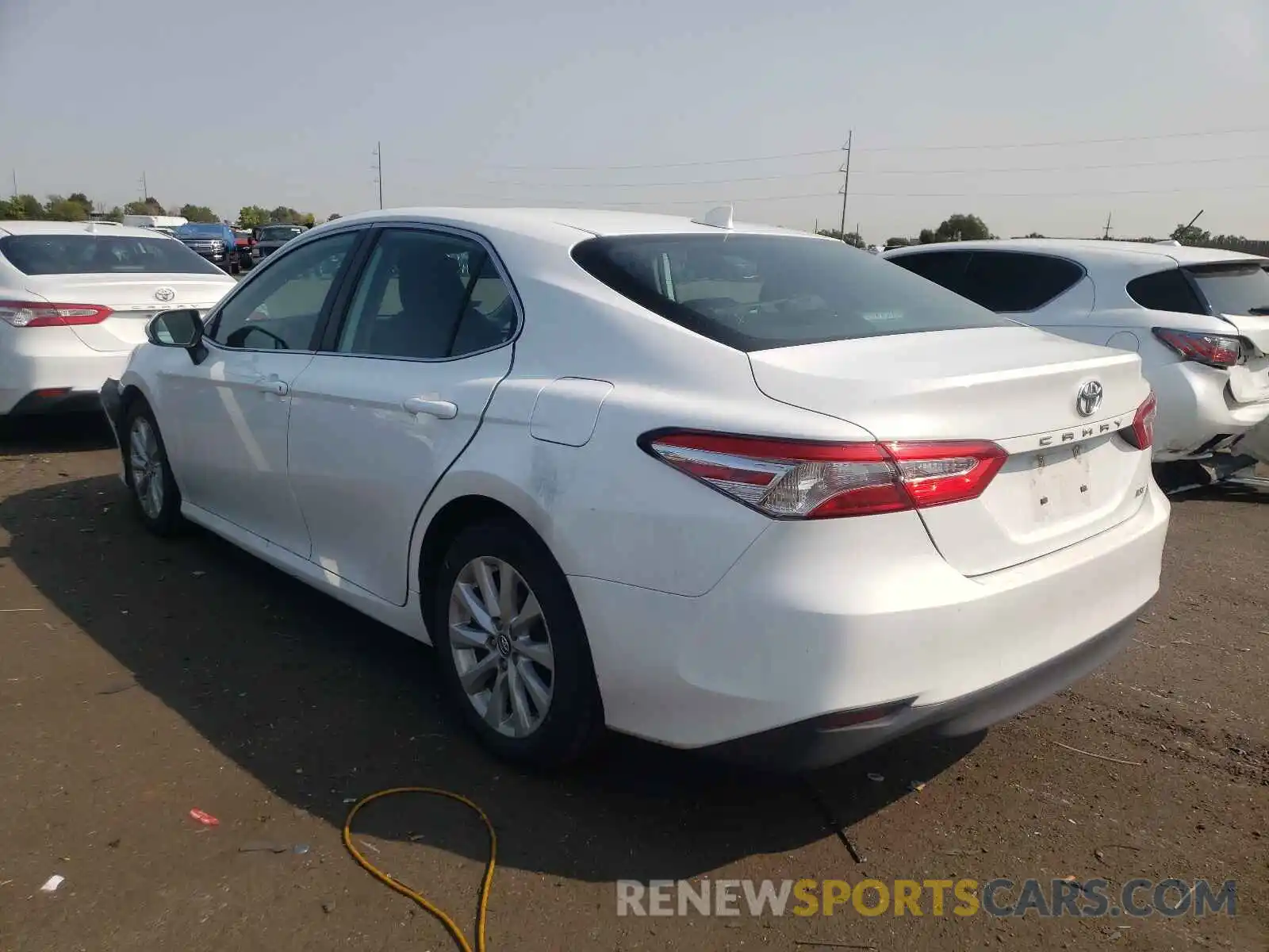 3 Photograph of a damaged car 4T1B11HK4KU269689 TOYOTA CAMRY 2019