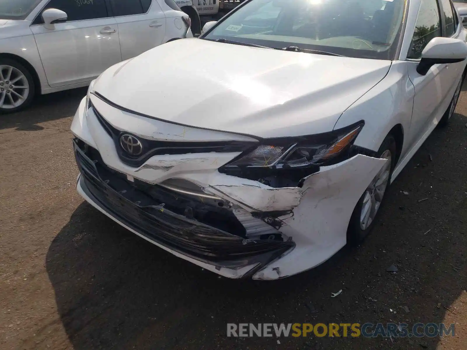 9 Photograph of a damaged car 4T1B11HK4KU269689 TOYOTA CAMRY 2019