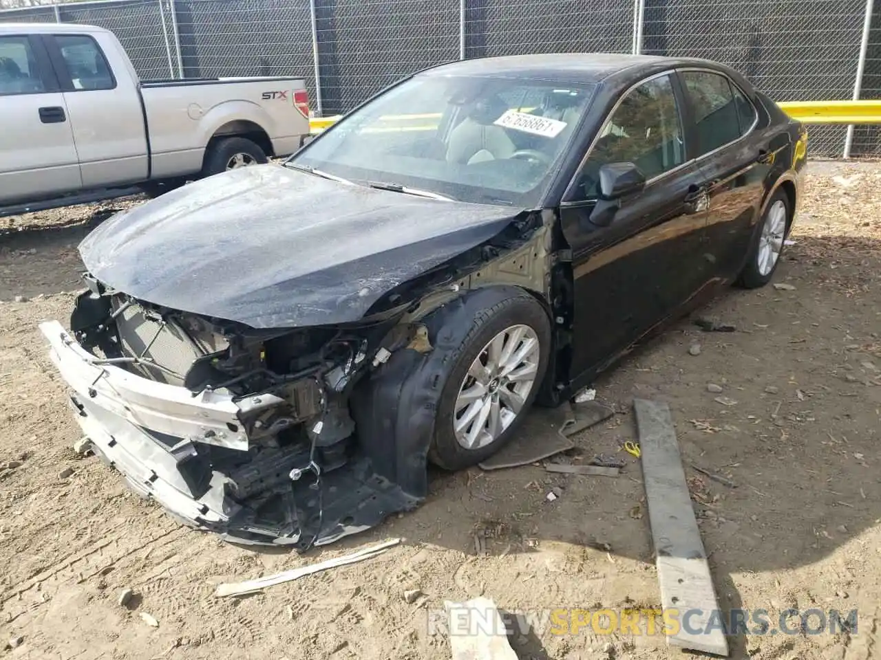 2 Photograph of a damaged car 4T1B11HK4KU272432 TOYOTA CAMRY 2019