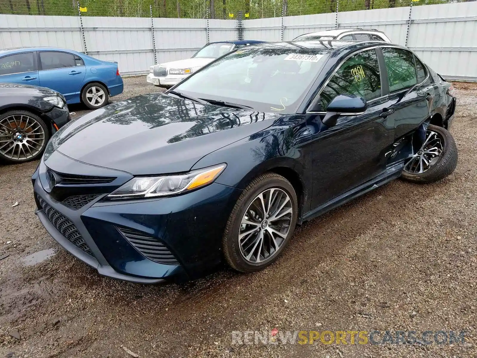 2 Photograph of a damaged car 4T1B11HK4KU275203 TOYOTA CAMRY 2019