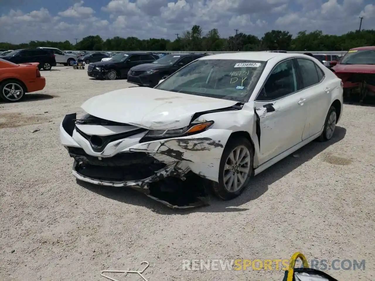 2 Photograph of a damaged car 4T1B11HK4KU275895 TOYOTA CAMRY 2019