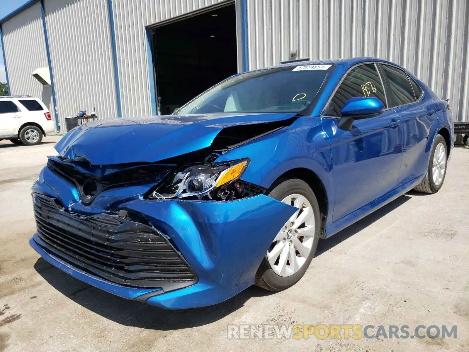 2 Photograph of a damaged car 4T1B11HK4KU279414 TOYOTA CAMRY 2019