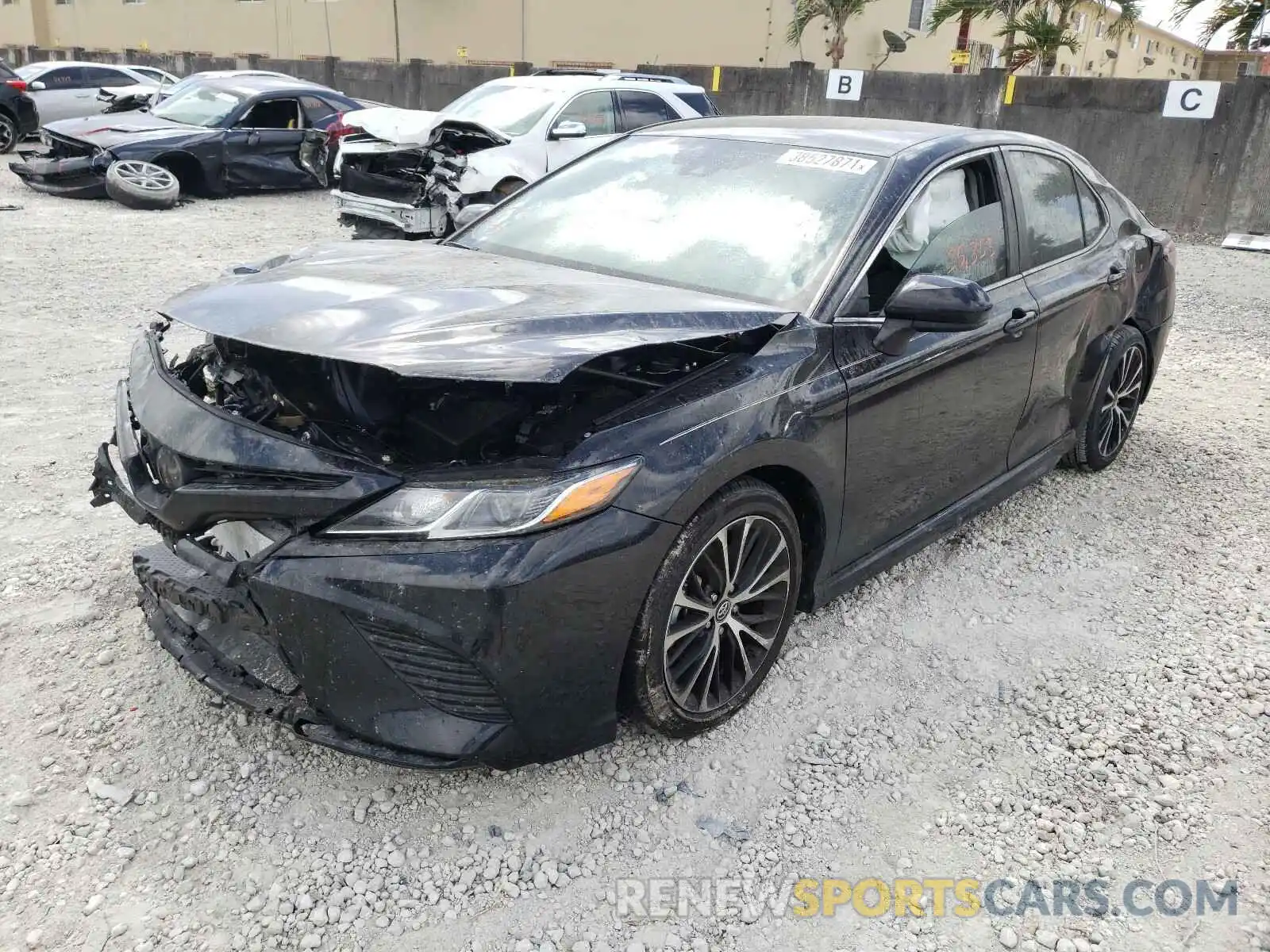 2 Photograph of a damaged car 4T1B11HK4KU279753 TOYOTA CAMRY 2019
