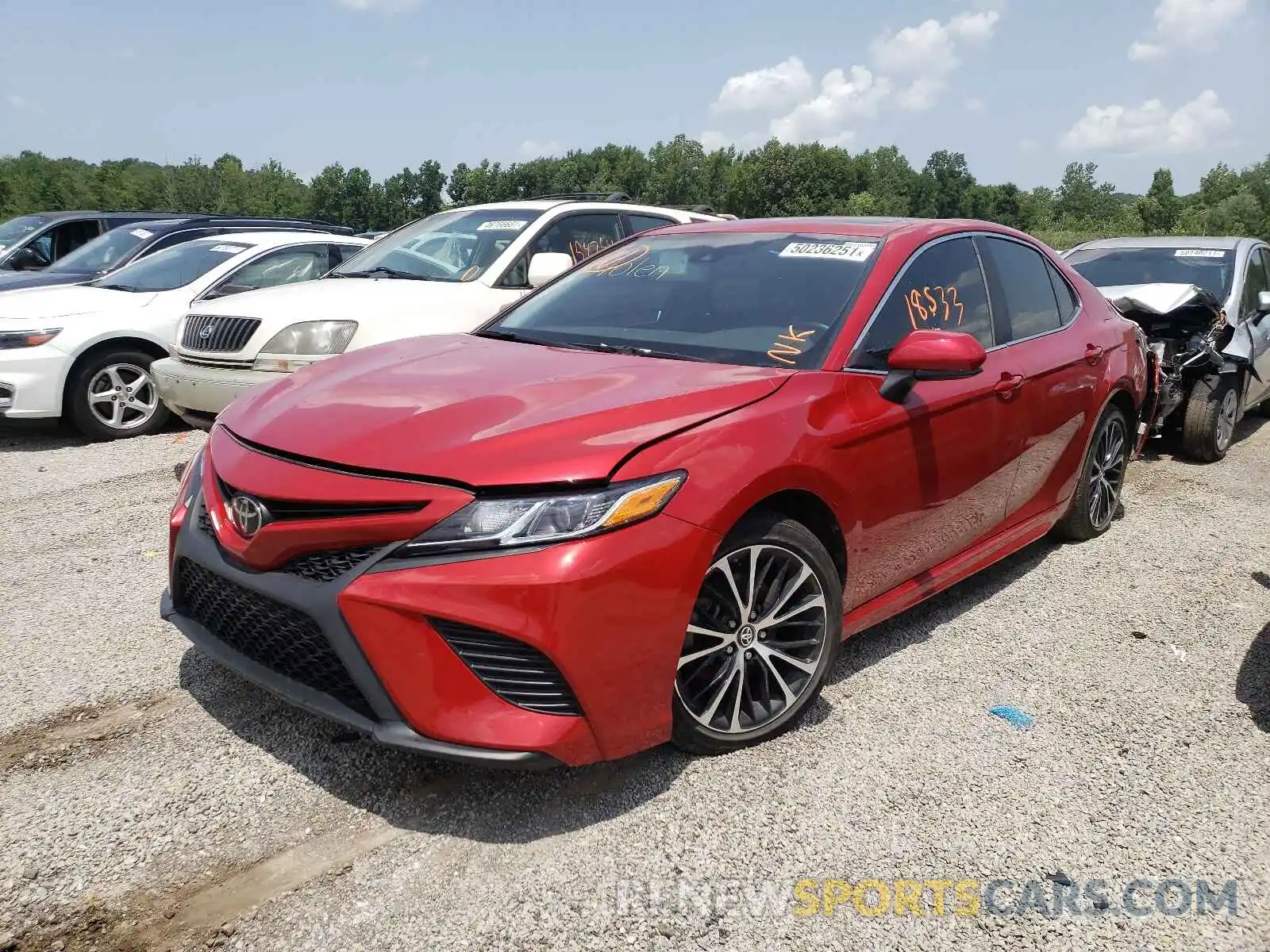 2 Photograph of a damaged car 4T1B11HK4KU281907 TOYOTA CAMRY 2019