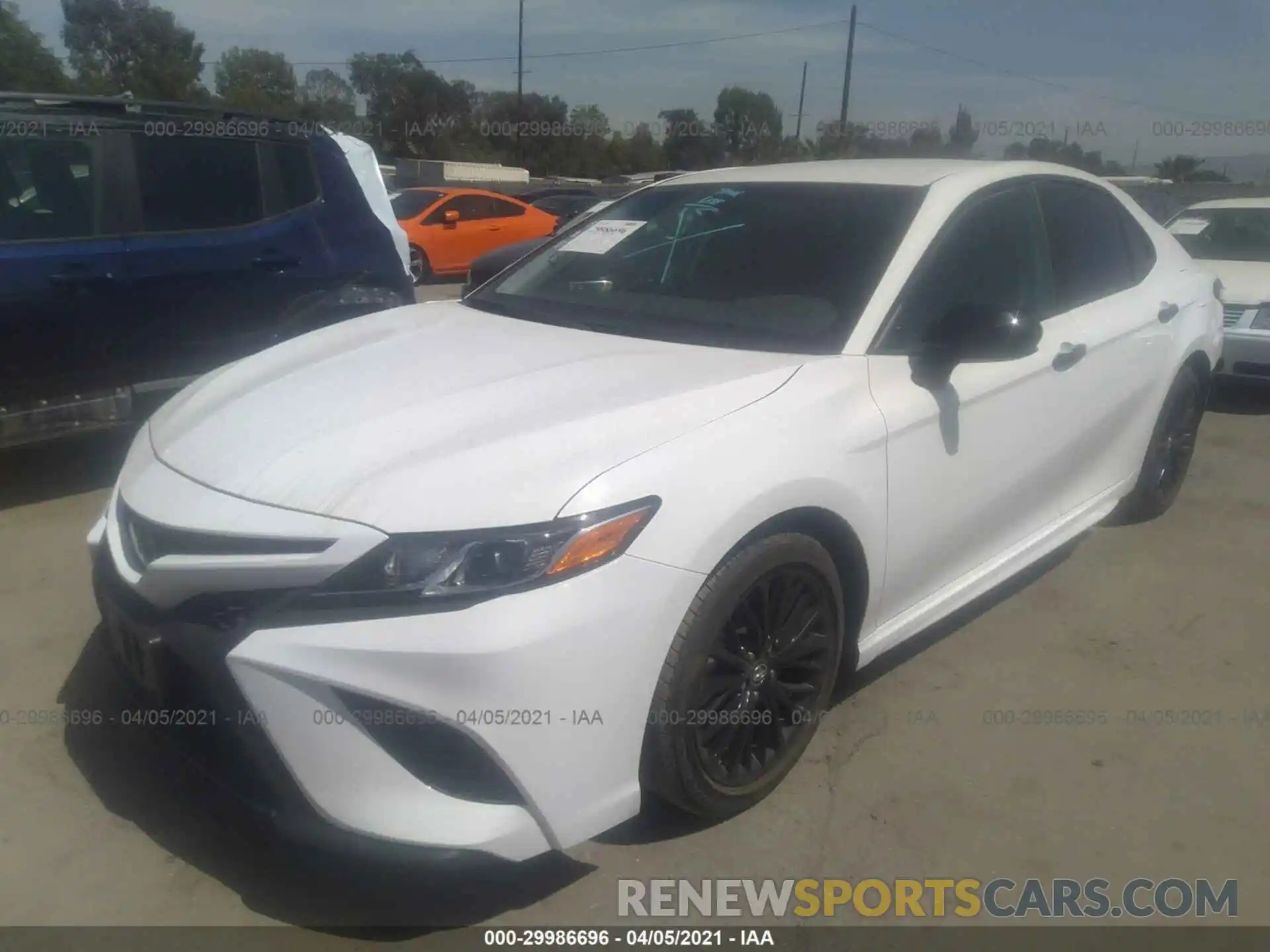 2 Photograph of a damaged car 4T1B11HK4KU282930 TOYOTA CAMRY 2019