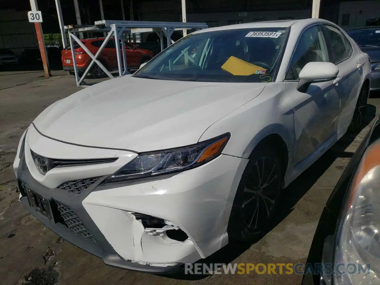 2 Photograph of a damaged car 4T1B11HK4KU286038 TOYOTA CAMRY 2019