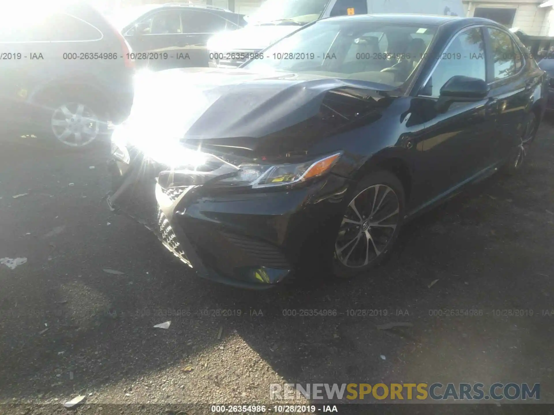 2 Photograph of a damaged car 4T1B11HK4KU286167 TOYOTA CAMRY 2019