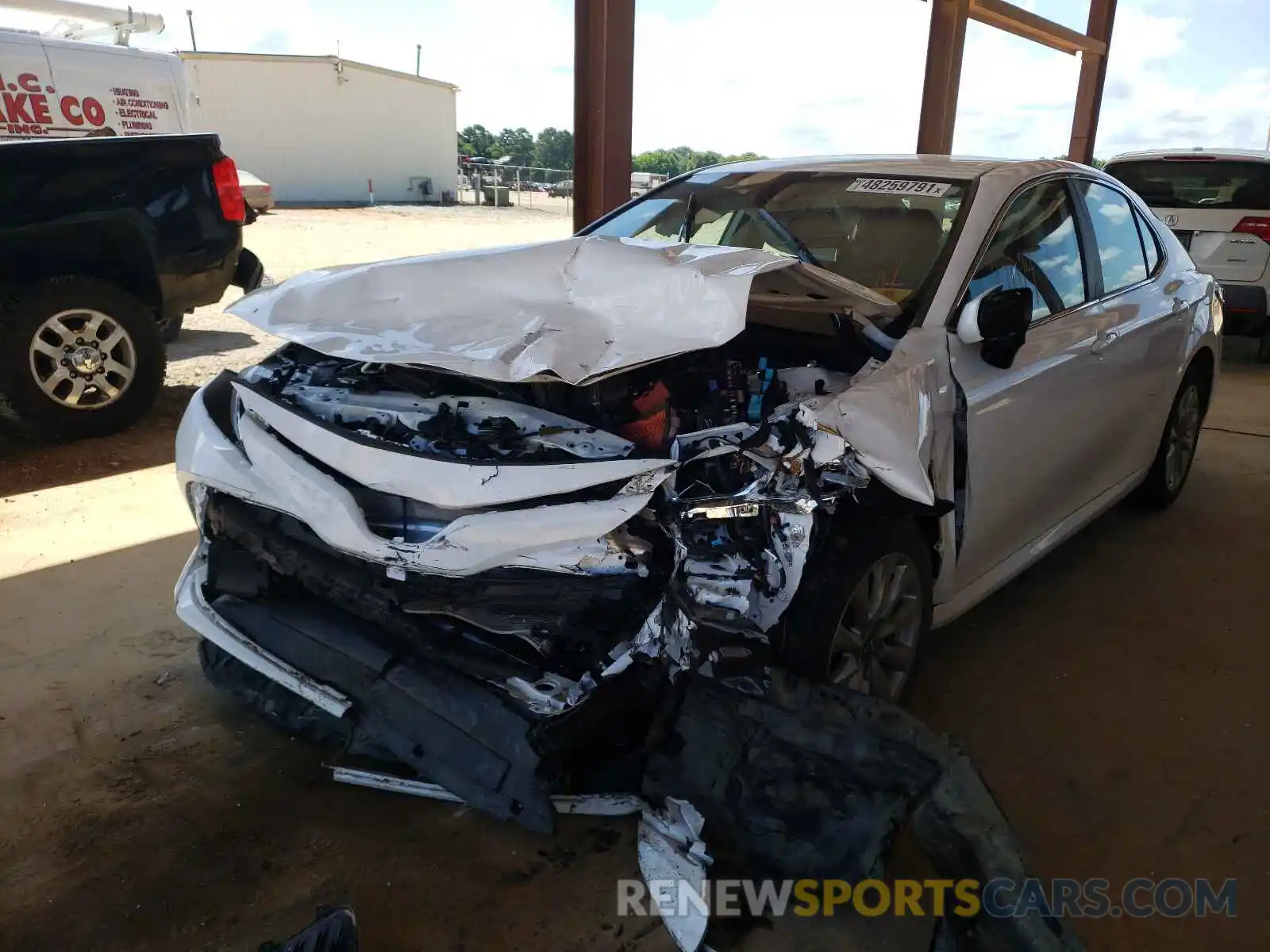 2 Photograph of a damaged car 4T1B11HK4KU291630 TOYOTA CAMRY 2019