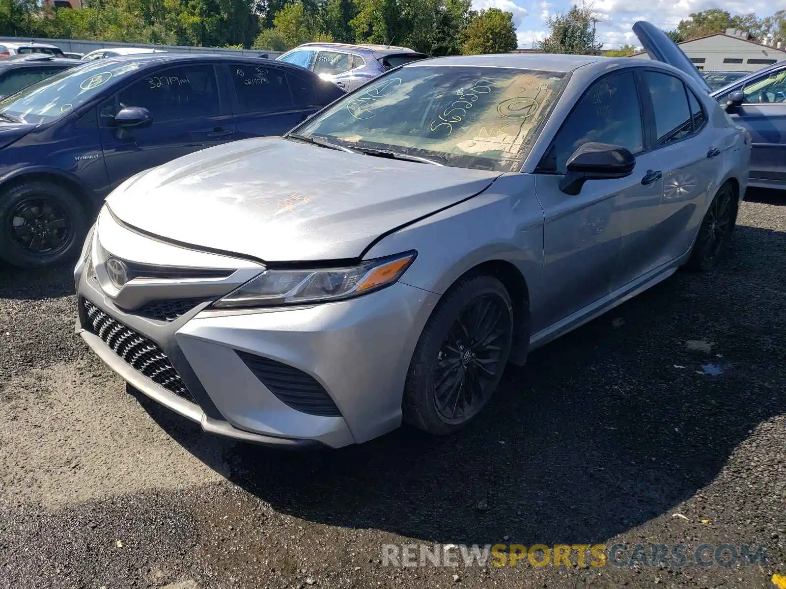 2 Photograph of a damaged car 4T1B11HK4KU291997 TOYOTA CAMRY 2019