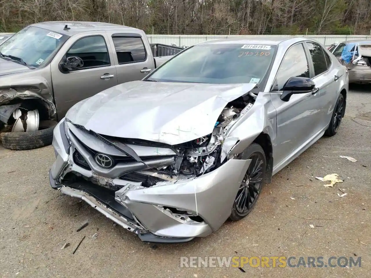 2 Photograph of a damaged car 4T1B11HK4KU293250 TOYOTA CAMRY 2019