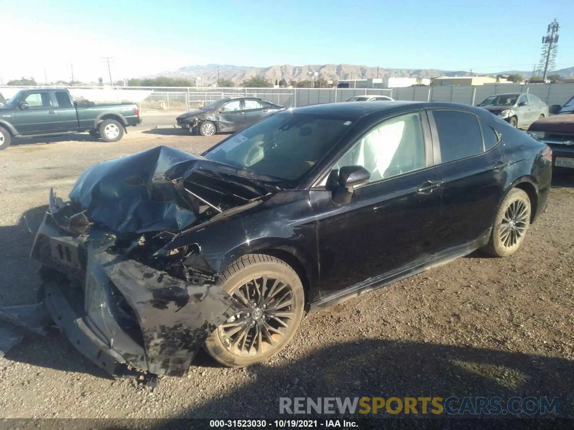 2 Photograph of a damaged car 4T1B11HK4KU299016 TOYOTA CAMRY 2019