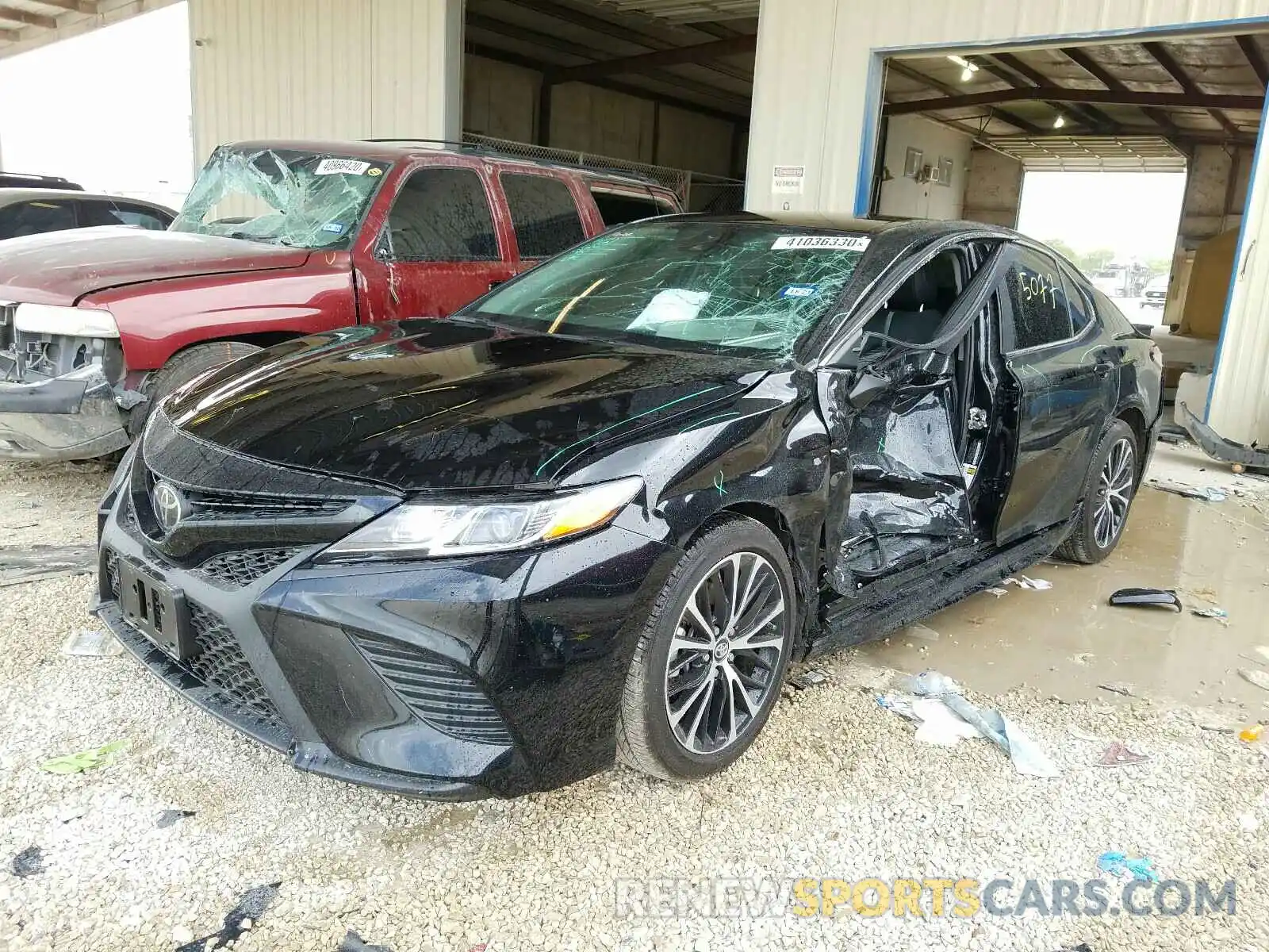 2 Photograph of a damaged car 4T1B11HK4KU299629 TOYOTA CAMRY 2019