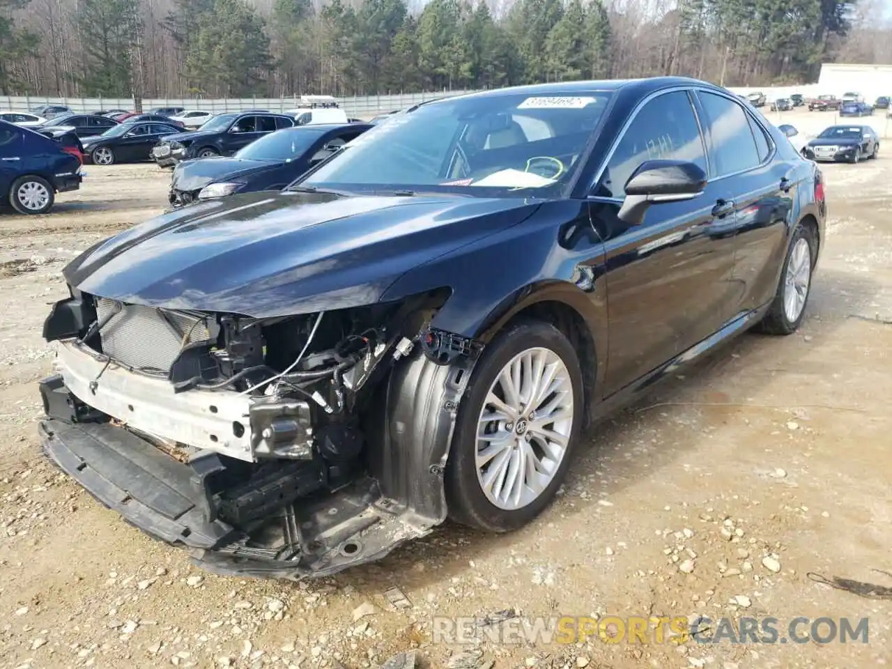 2 Photograph of a damaged car 4T1B11HK4KU299663 TOYOTA CAMRY 2019