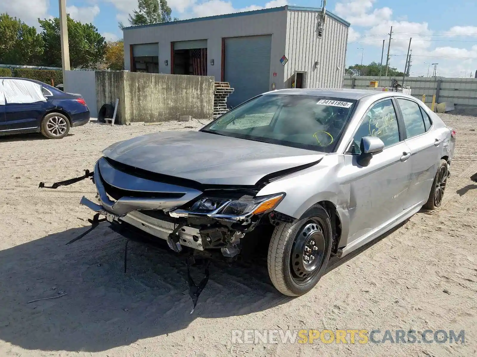 2 Photograph of a damaged car 4T1B11HK4KU679554 TOYOTA CAMRY 2019