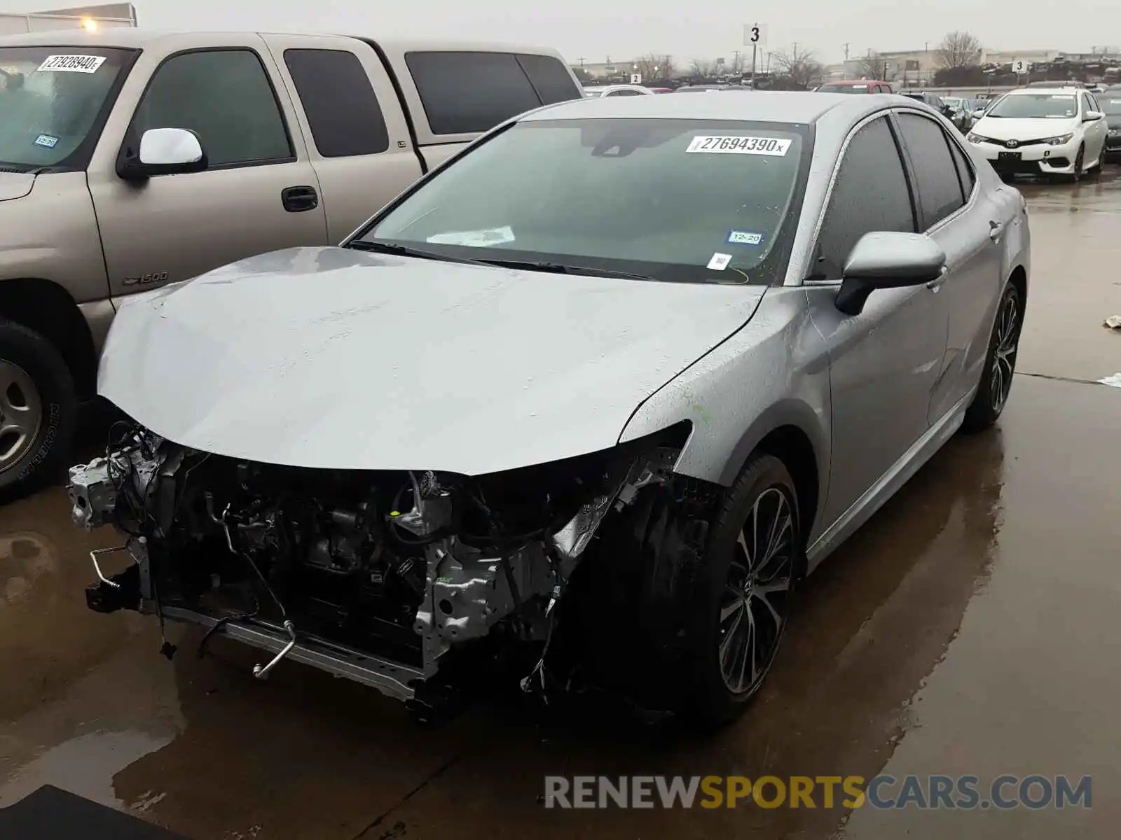 2 Photograph of a damaged car 4T1B11HK4KU679912 TOYOTA CAMRY 2019