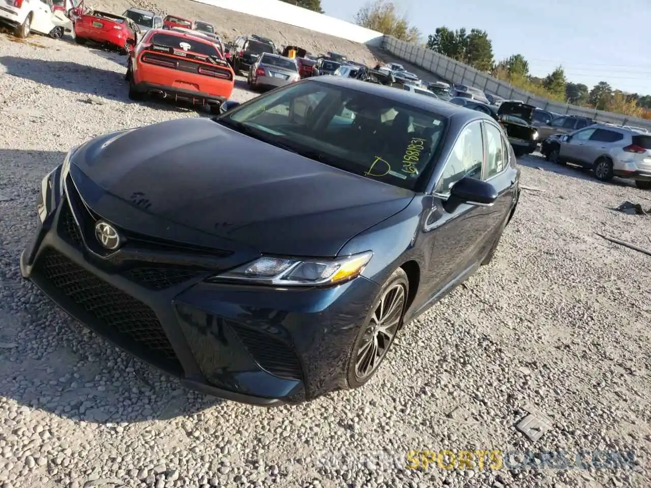 2 Photograph of a damaged car 4T1B11HK4KU680817 TOYOTA CAMRY 2019