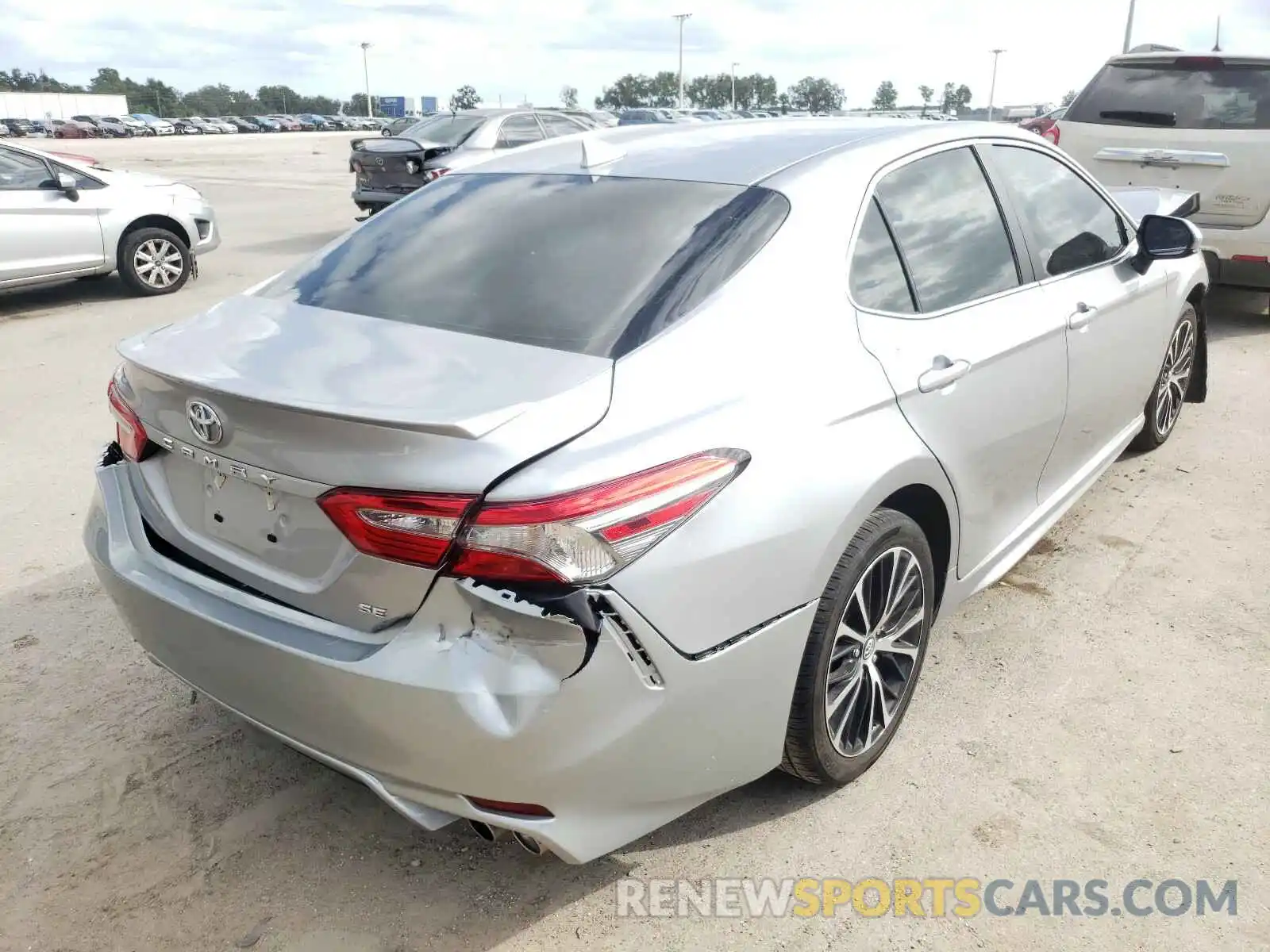 4 Photograph of a damaged car 4T1B11HK4KU682597 TOYOTA CAMRY 2019