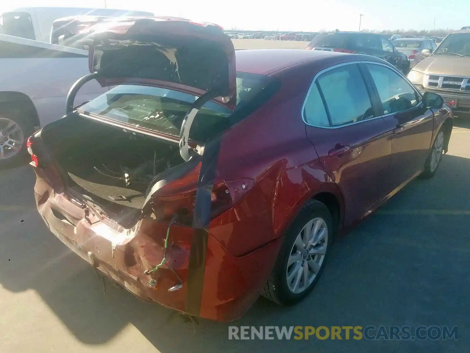 4 Photograph of a damaged car 4T1B11HK4KU683801 TOYOTA CAMRY 2019