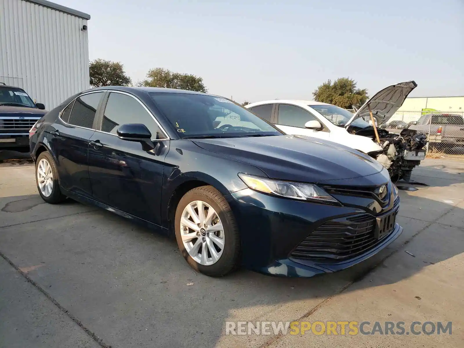 1 Photograph of a damaged car 4T1B11HK4KU683975 TOYOTA CAMRY 2019