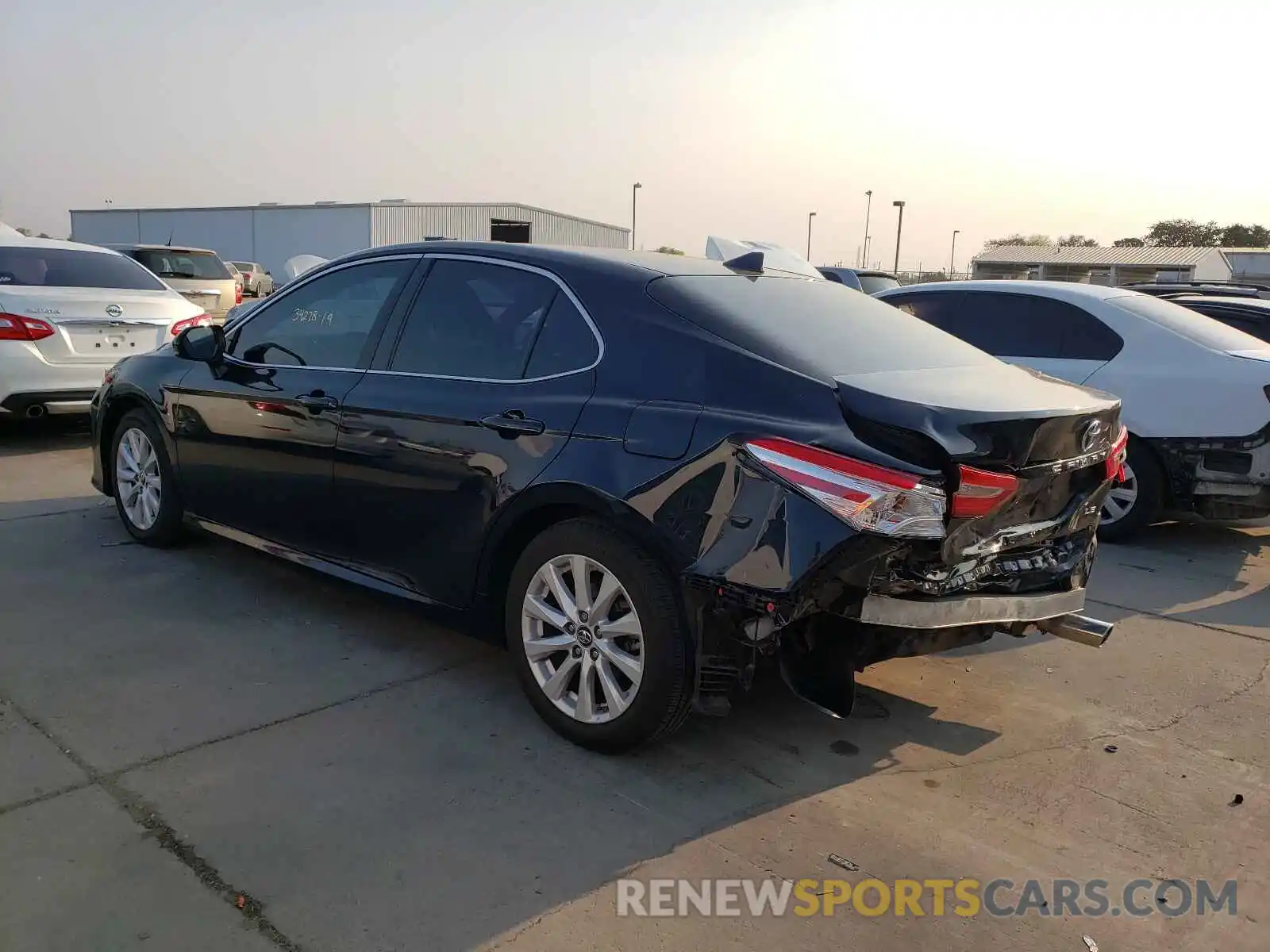 3 Photograph of a damaged car 4T1B11HK4KU683975 TOYOTA CAMRY 2019