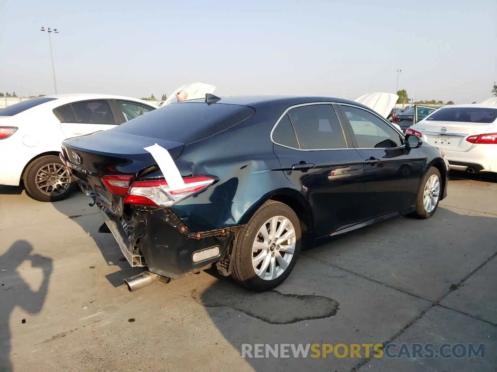 4 Photograph of a damaged car 4T1B11HK4KU683975 TOYOTA CAMRY 2019