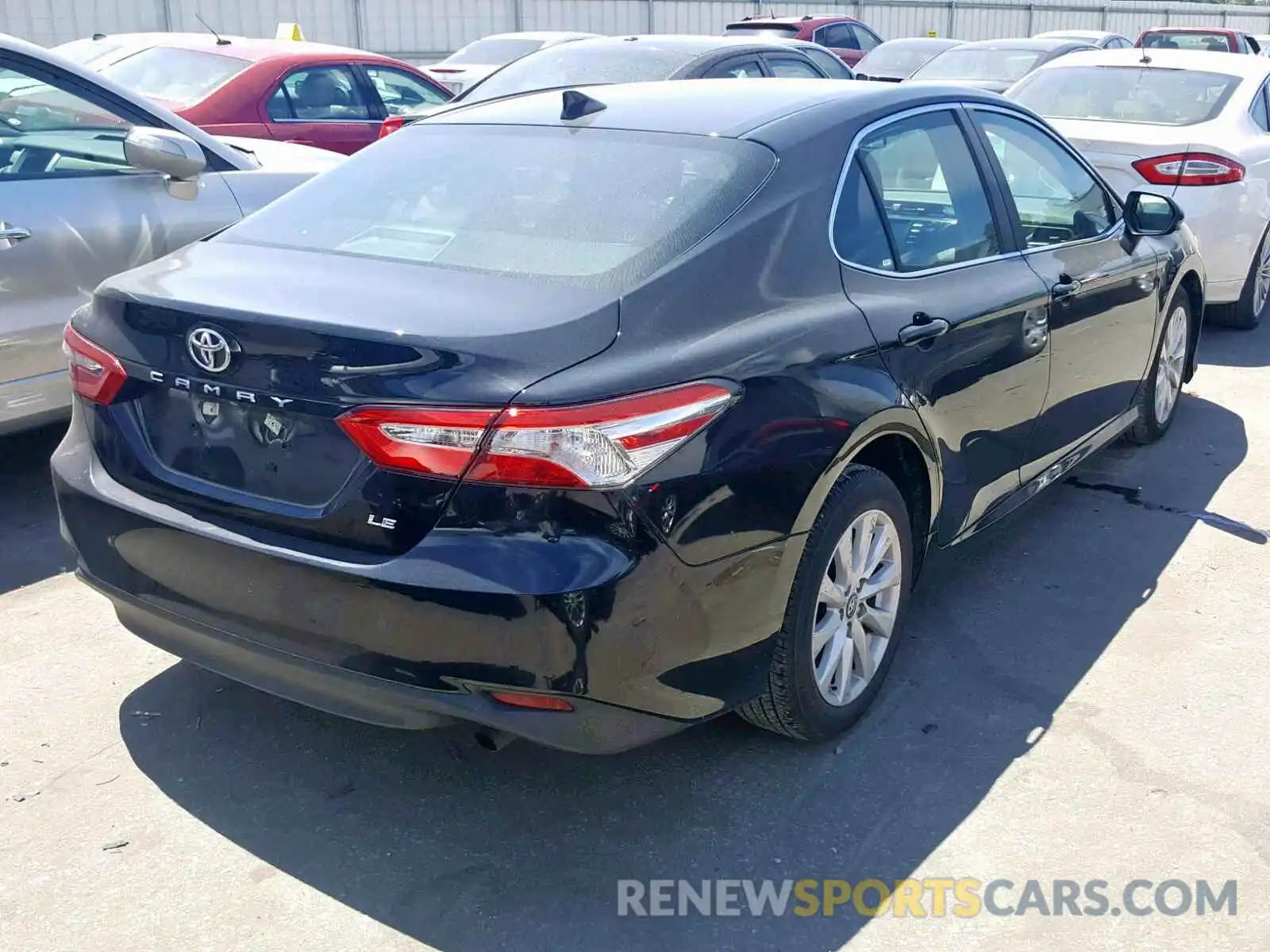 4 Photograph of a damaged car 4T1B11HK4KU686228 TOYOTA CAMRY 2019