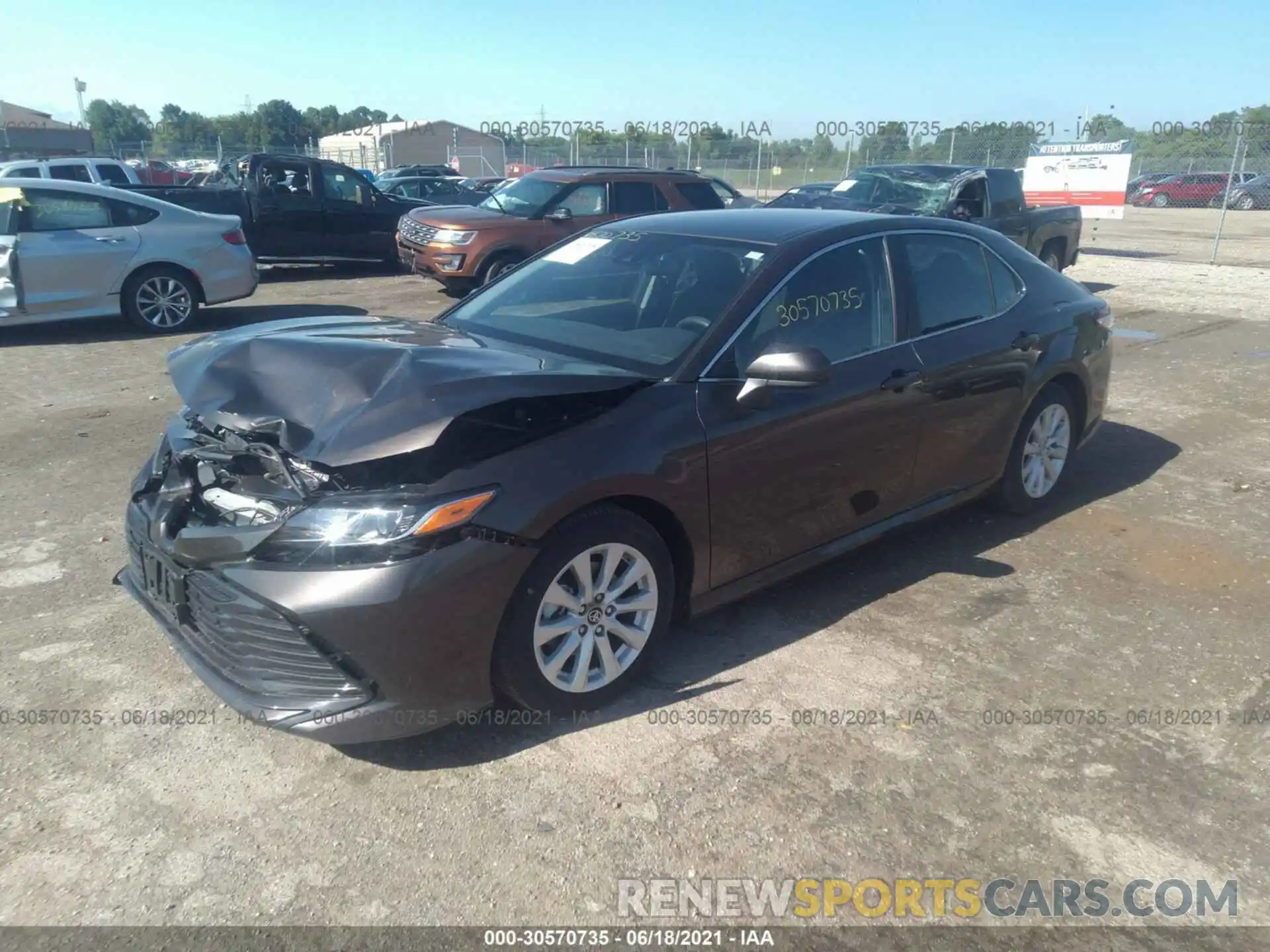 2 Photograph of a damaged car 4T1B11HK4KU686472 TOYOTA CAMRY 2019