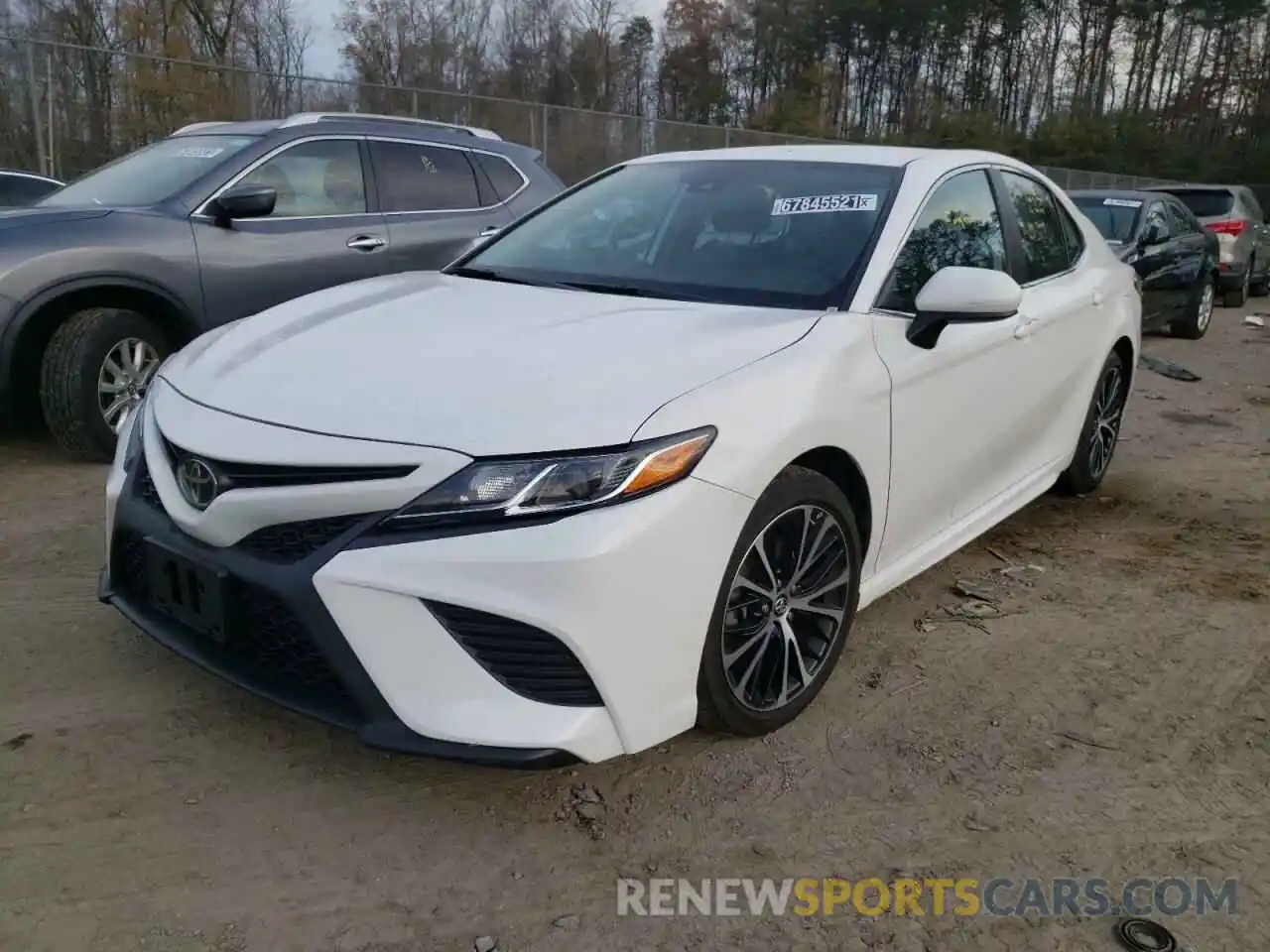 2 Photograph of a damaged car 4T1B11HK4KU687315 TOYOTA CAMRY 2019