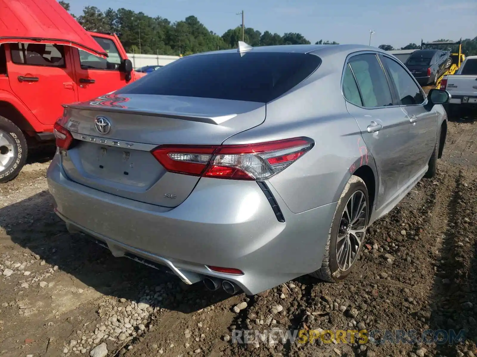 4 Photograph of a damaged car 4T1B11HK4KU689601 TOYOTA CAMRY 2019