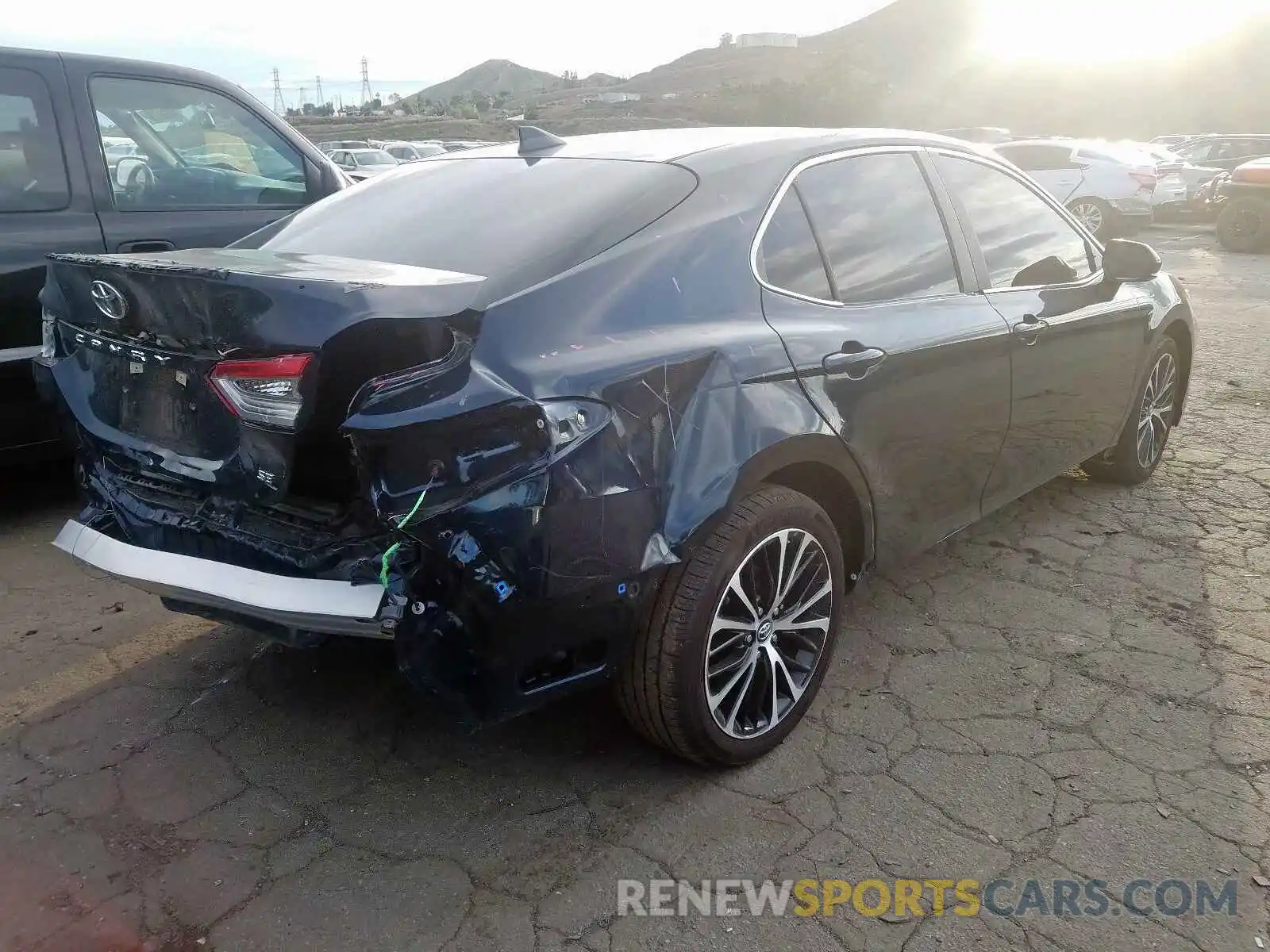 4 Photograph of a damaged car 4T1B11HK4KU690554 TOYOTA CAMRY 2019