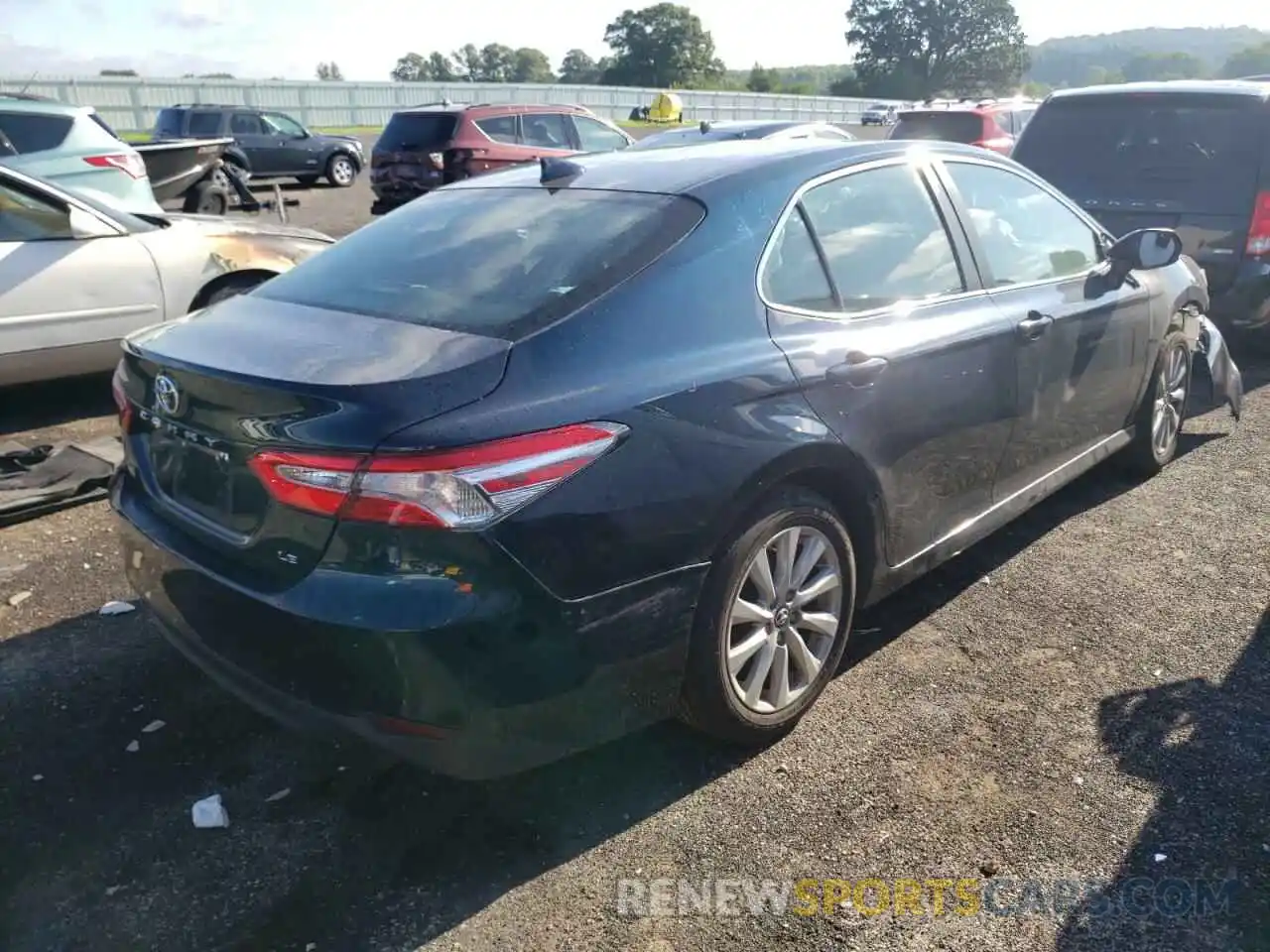 4 Photograph of a damaged car 4T1B11HK4KU690862 TOYOTA CAMRY 2019