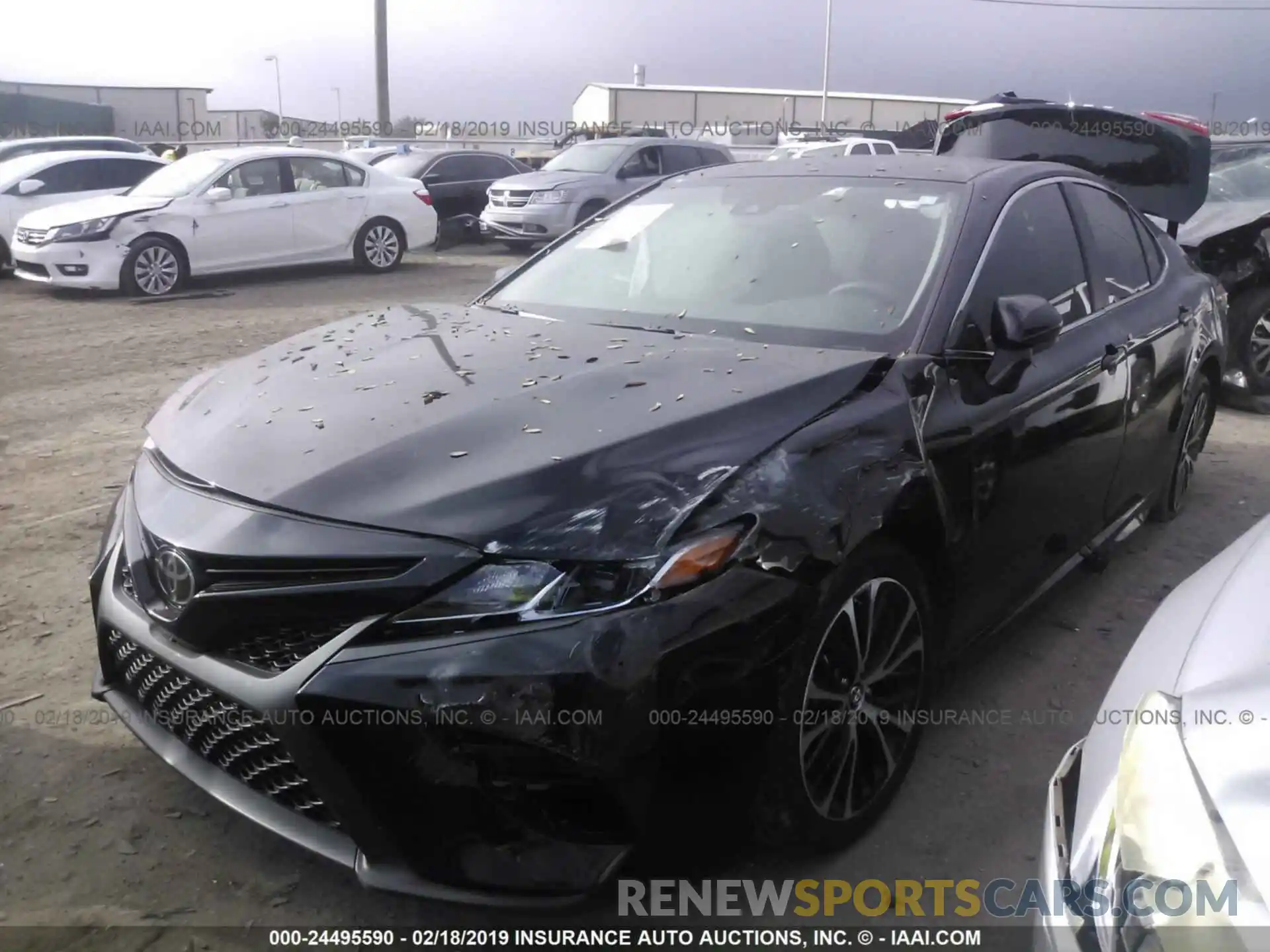 2 Photograph of a damaged car 4T1B11HK4KU690960 TOYOTA CAMRY 2019