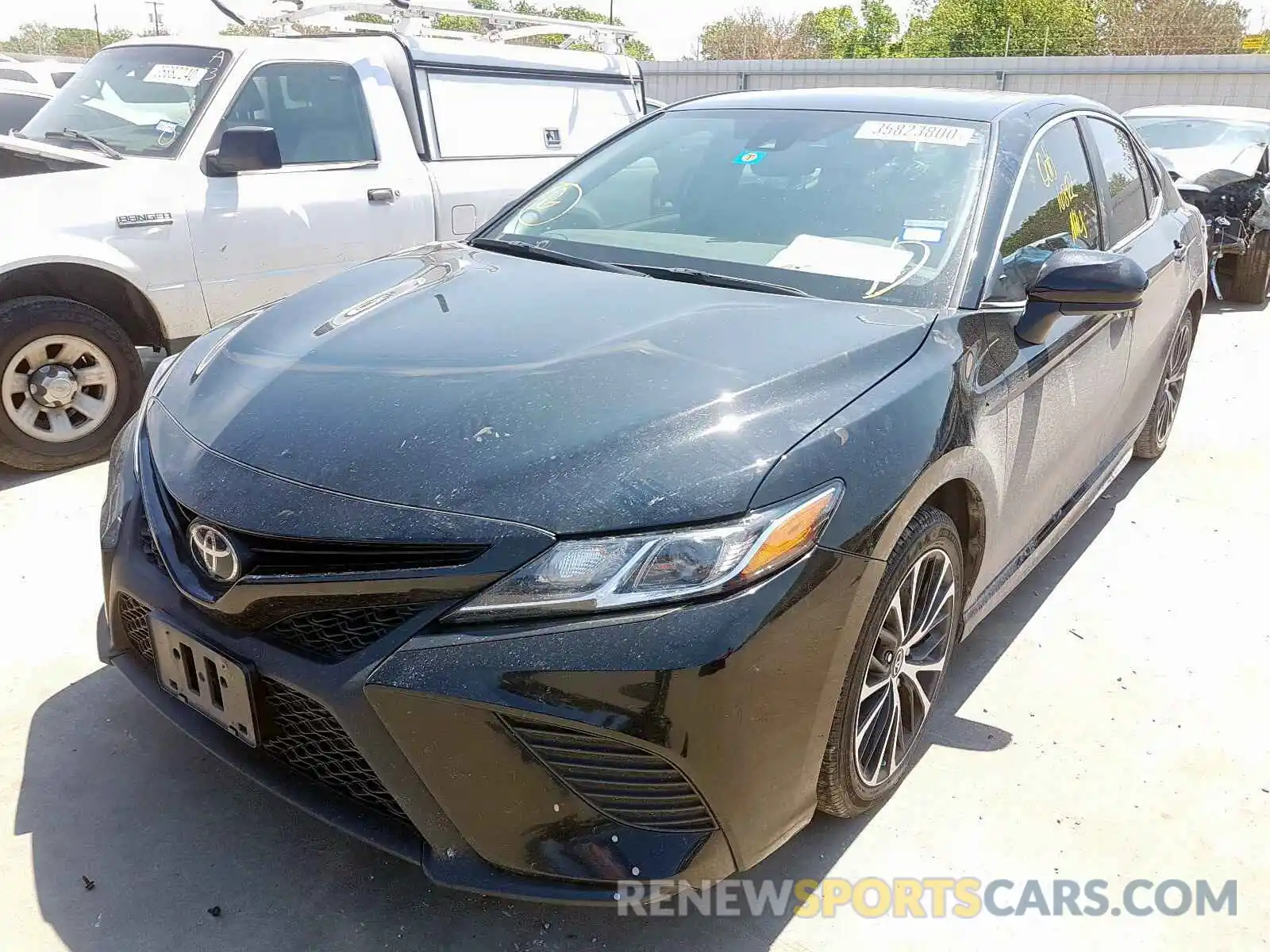 2 Photograph of a damaged car 4T1B11HK4KU691607 TOYOTA CAMRY 2019