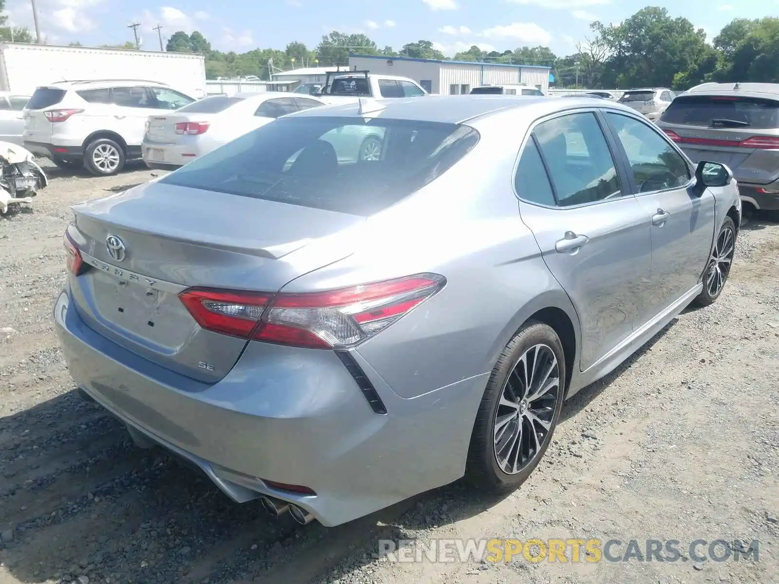 4 Photograph of a damaged car 4T1B11HK4KU691994 TOYOTA CAMRY 2019