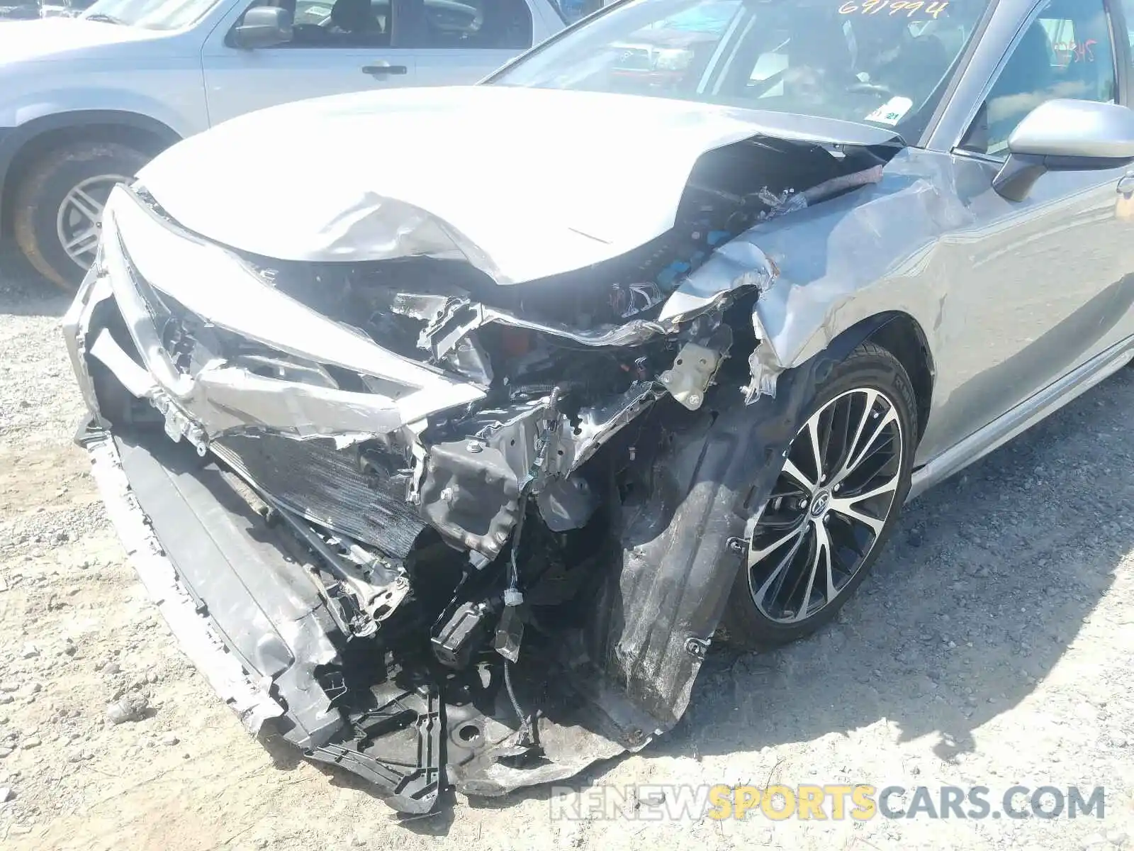 9 Photograph of a damaged car 4T1B11HK4KU691994 TOYOTA CAMRY 2019