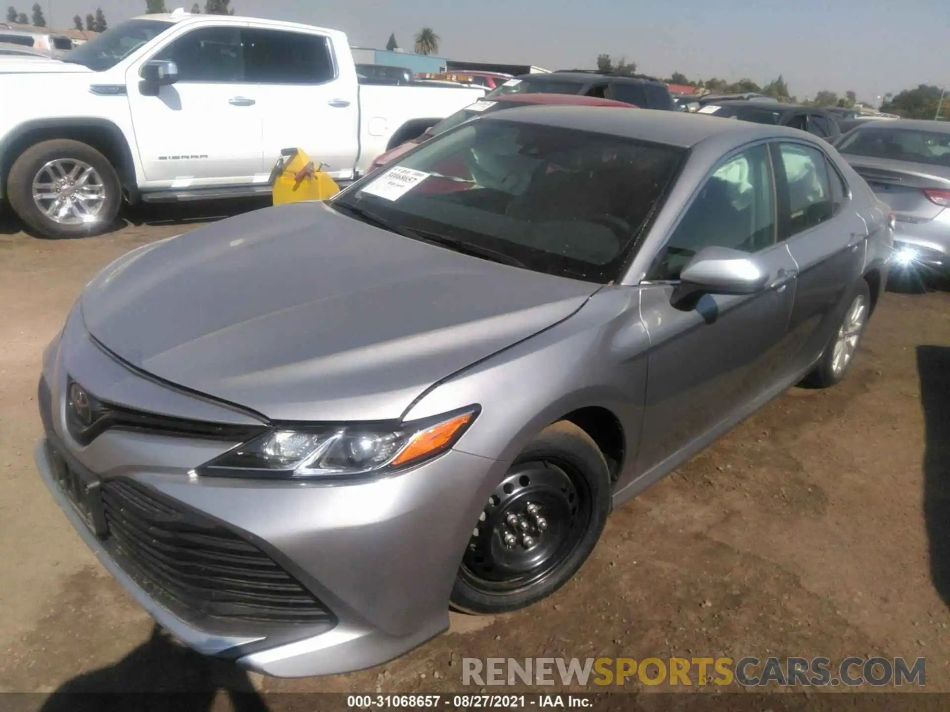 2 Photograph of a damaged car 4T1B11HK4KU692031 TOYOTA CAMRY 2019