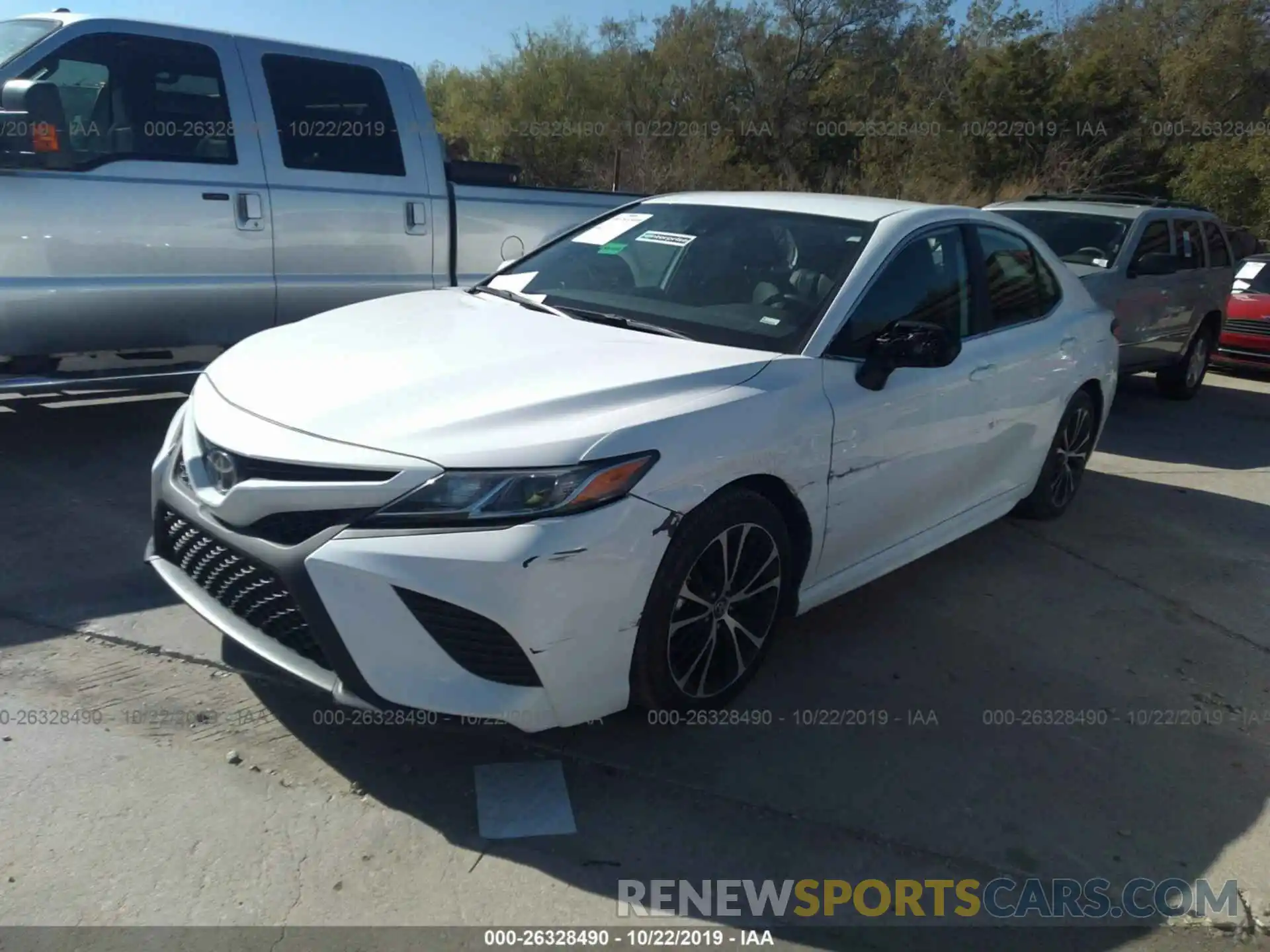 2 Photograph of a damaged car 4T1B11HK4KU692983 TOYOTA CAMRY 2019