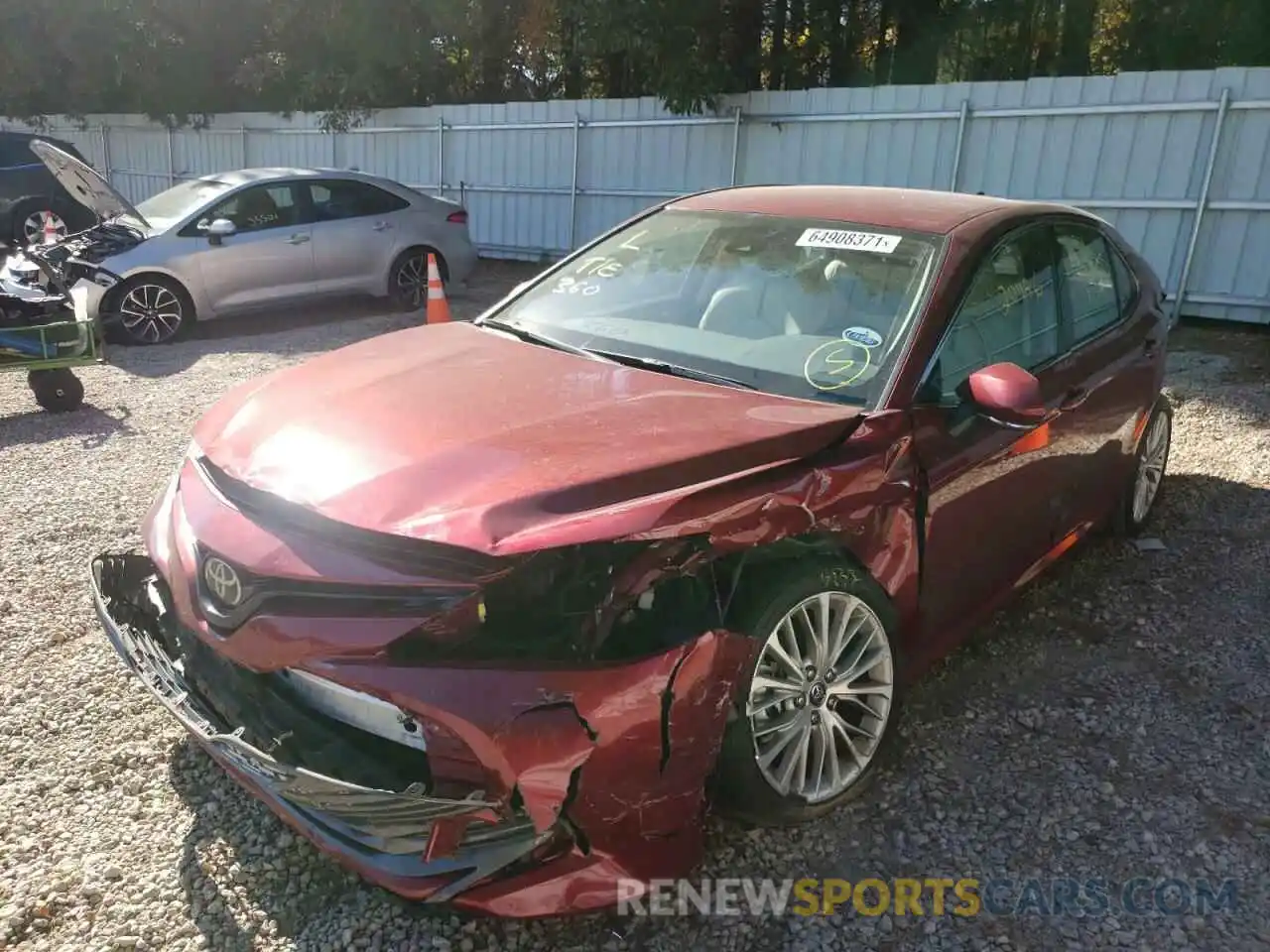 2 Photograph of a damaged car 4T1B11HK4KU693891 TOYOTA CAMRY 2019