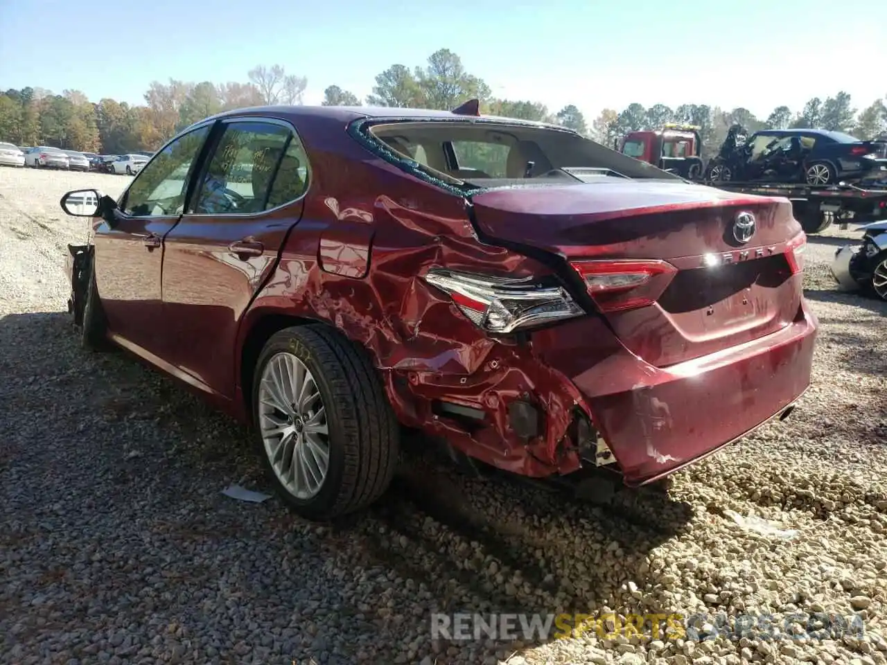 3 Photograph of a damaged car 4T1B11HK4KU693891 TOYOTA CAMRY 2019