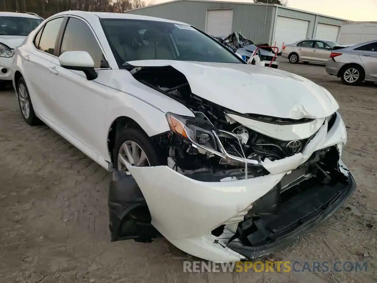 1 Photograph of a damaged car 4T1B11HK4KU696158 TOYOTA CAMRY 2019