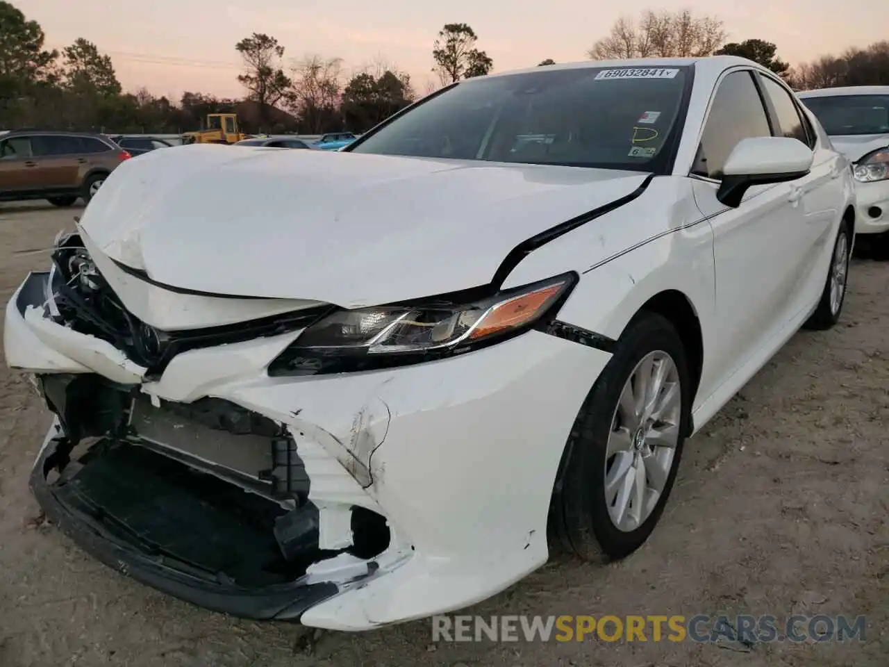 2 Photograph of a damaged car 4T1B11HK4KU696158 TOYOTA CAMRY 2019