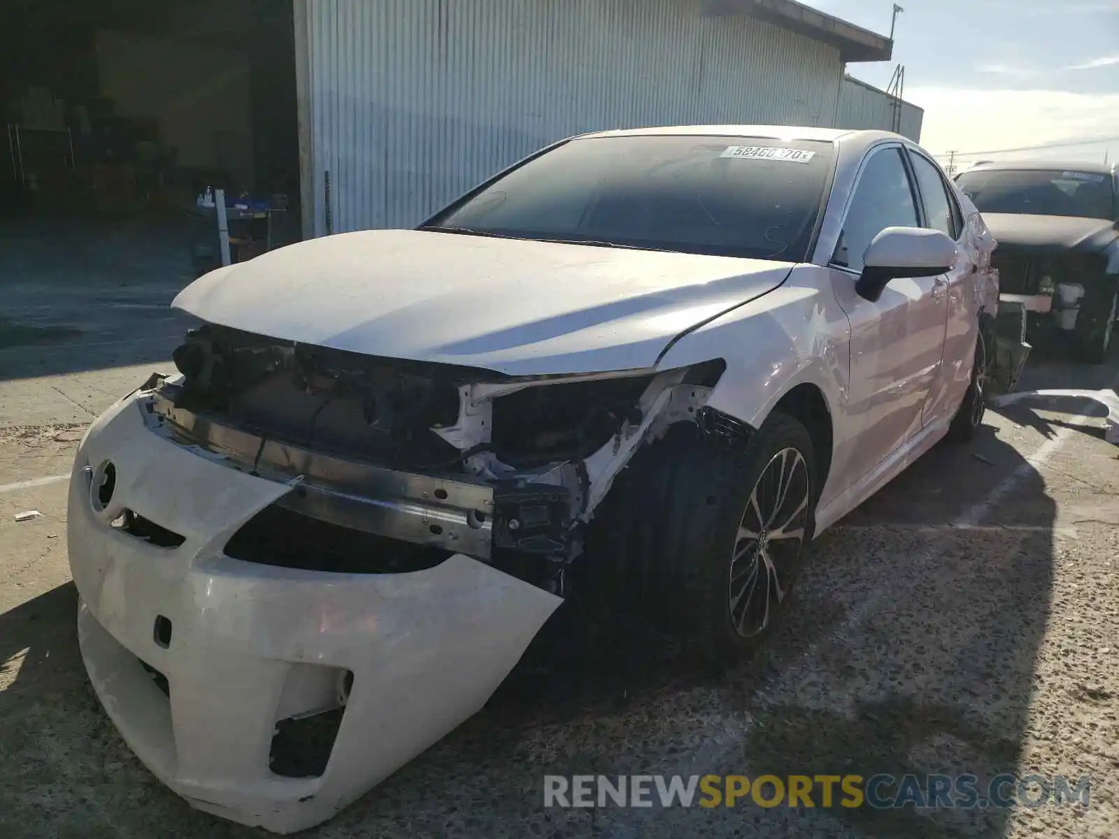 2 Photograph of a damaged car 4T1B11HK4KU697343 TOYOTA CAMRY 2019