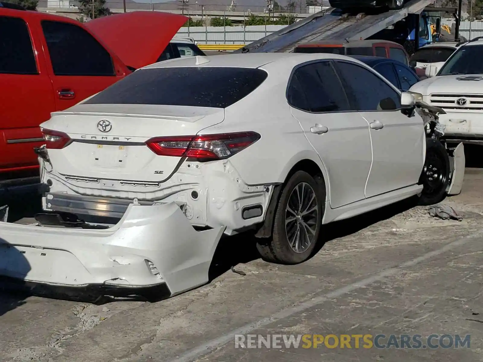 4 Photograph of a damaged car 4T1B11HK4KU697343 TOYOTA CAMRY 2019