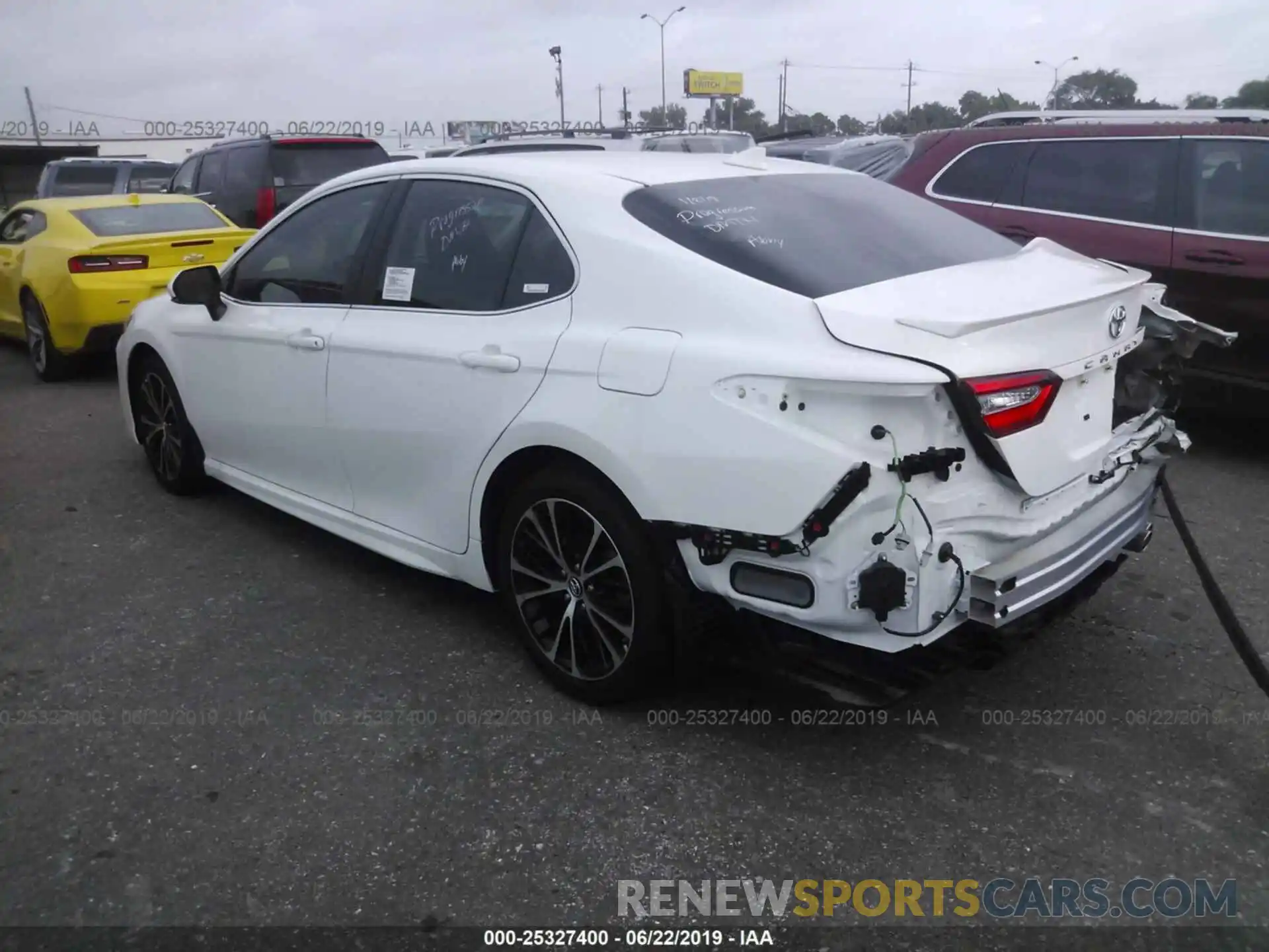 3 Photograph of a damaged car 4T1B11HK4KU697455 TOYOTA CAMRY 2019