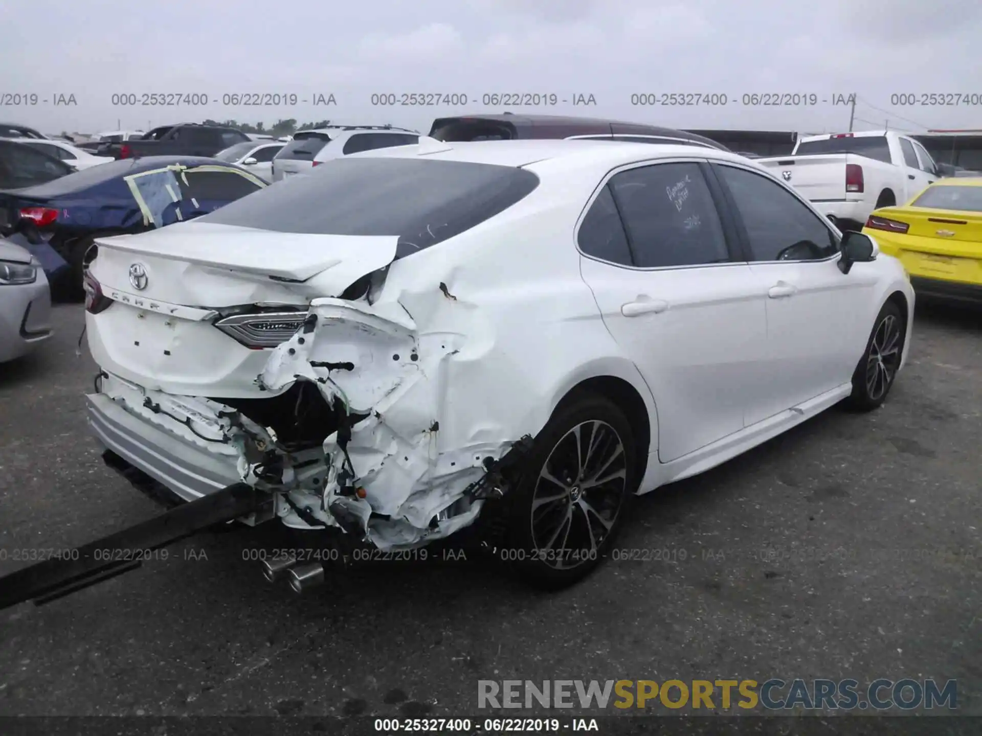 4 Photograph of a damaged car 4T1B11HK4KU697455 TOYOTA CAMRY 2019