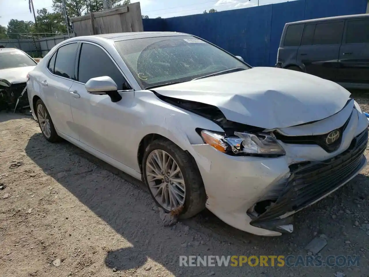 1 Photograph of a damaged car 4T1B11HK4KU698945 TOYOTA CAMRY 2019