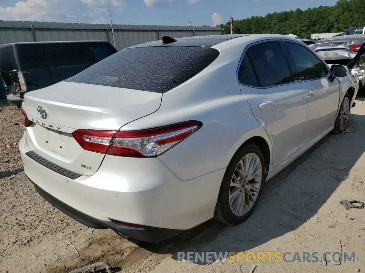 4 Photograph of a damaged car 4T1B11HK4KU698945 TOYOTA CAMRY 2019