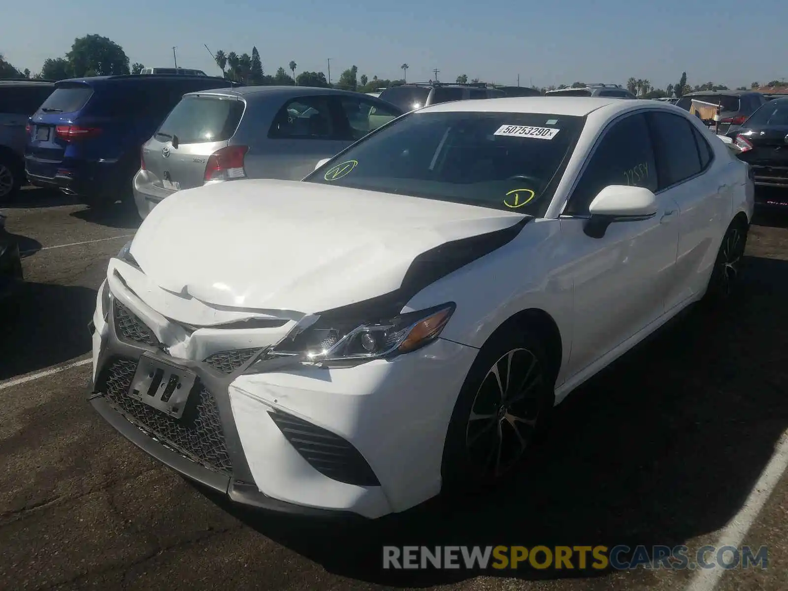 2 Photograph of a damaged car 4T1B11HK4KU701150 TOYOTA CAMRY 2019