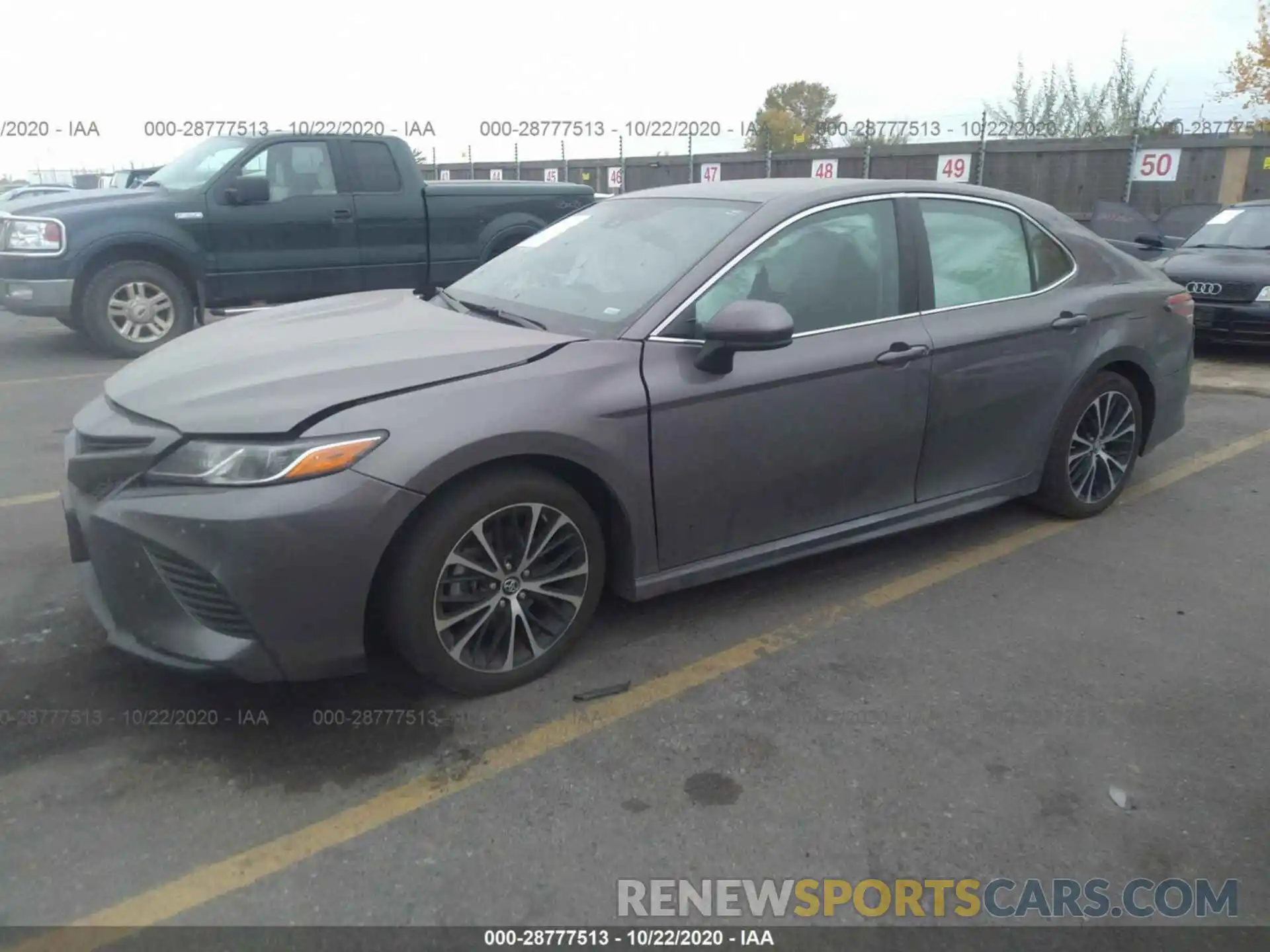 2 Photograph of a damaged car 4T1B11HK4KU701598 TOYOTA CAMRY 2019