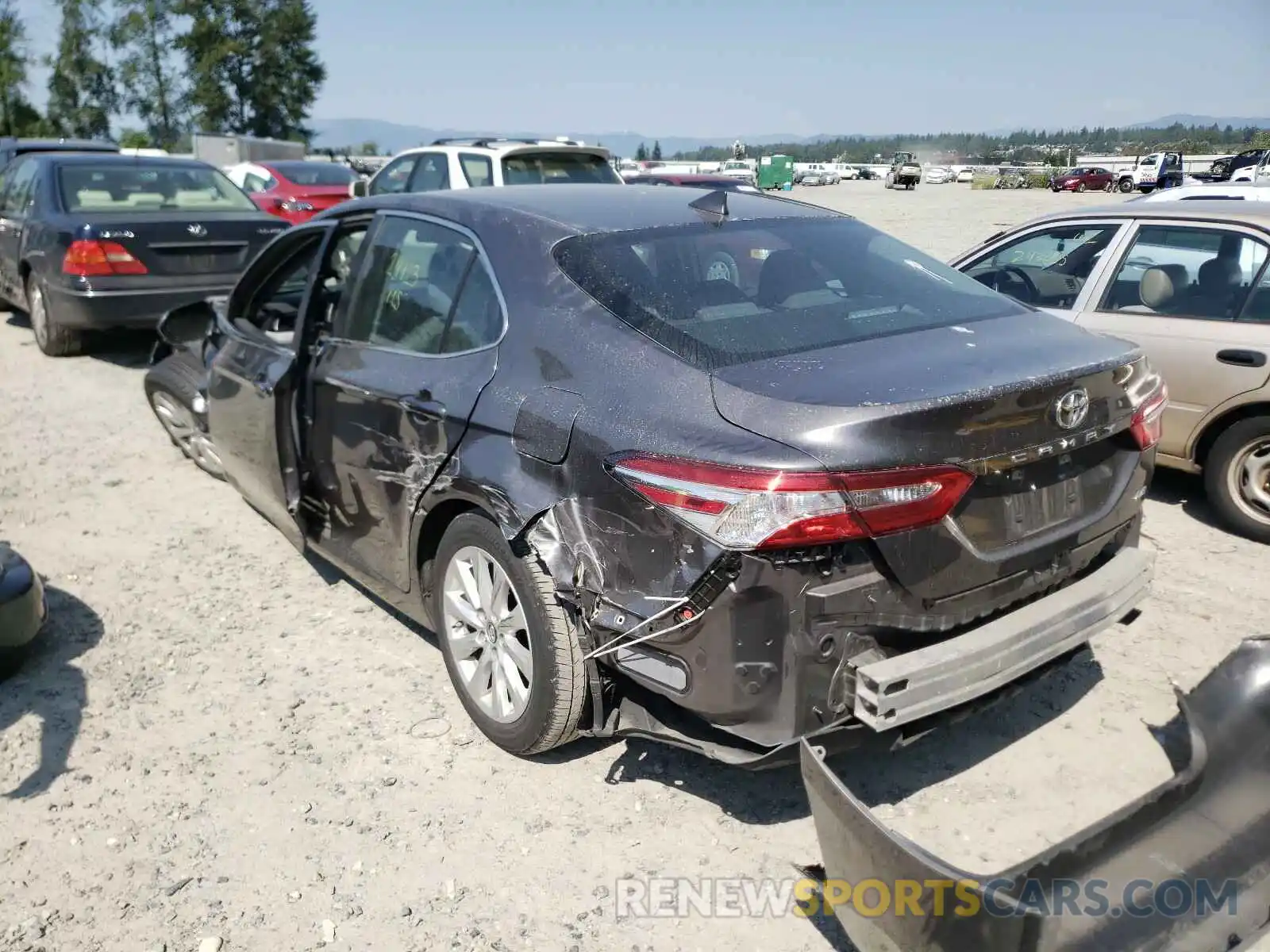 3 Photograph of a damaged car 4T1B11HK4KU701682 TOYOTA CAMRY 2019